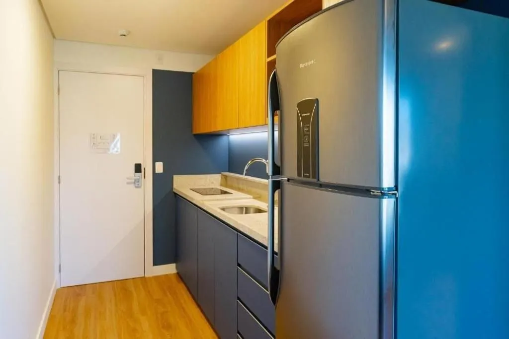 Kitchen or kitchenette in Atrium Studios by Xtay - Conforto em Palhoça, a poucos metros da praia