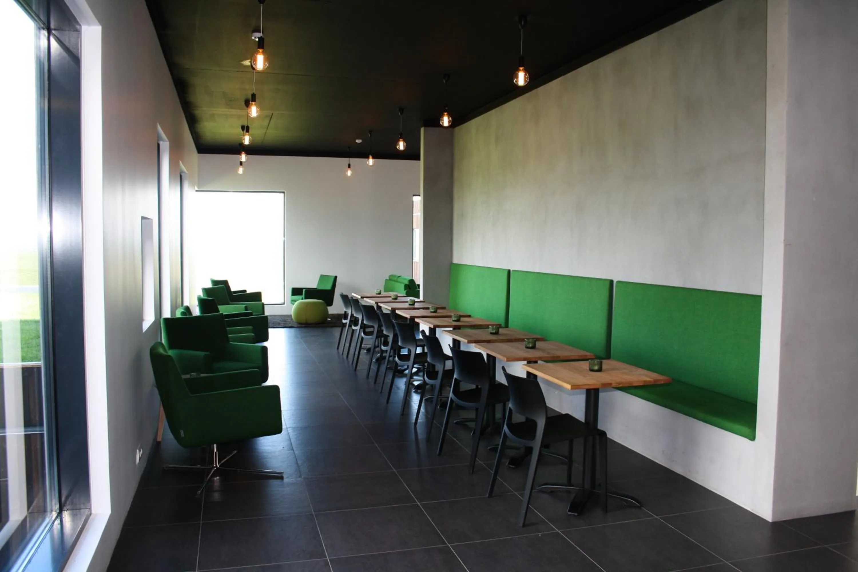 Communal lounge/ TV room in Hótel Laxá