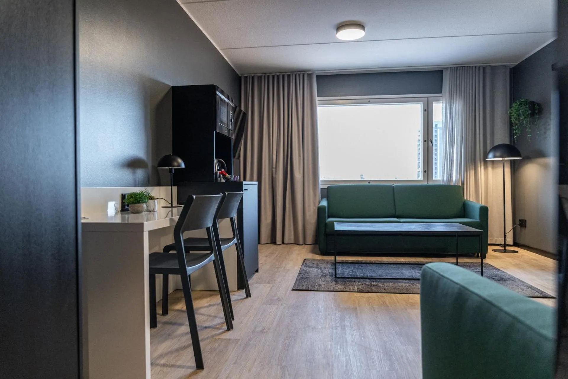 Living room in Hotelli Sointu by UHANDA