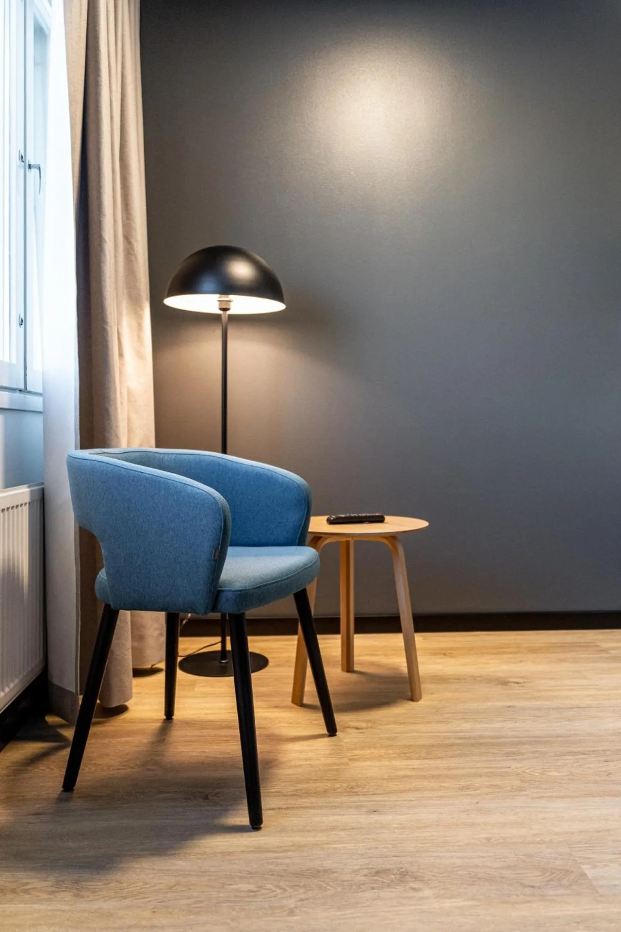 Living room in Hotelli Sointu by UHANDA