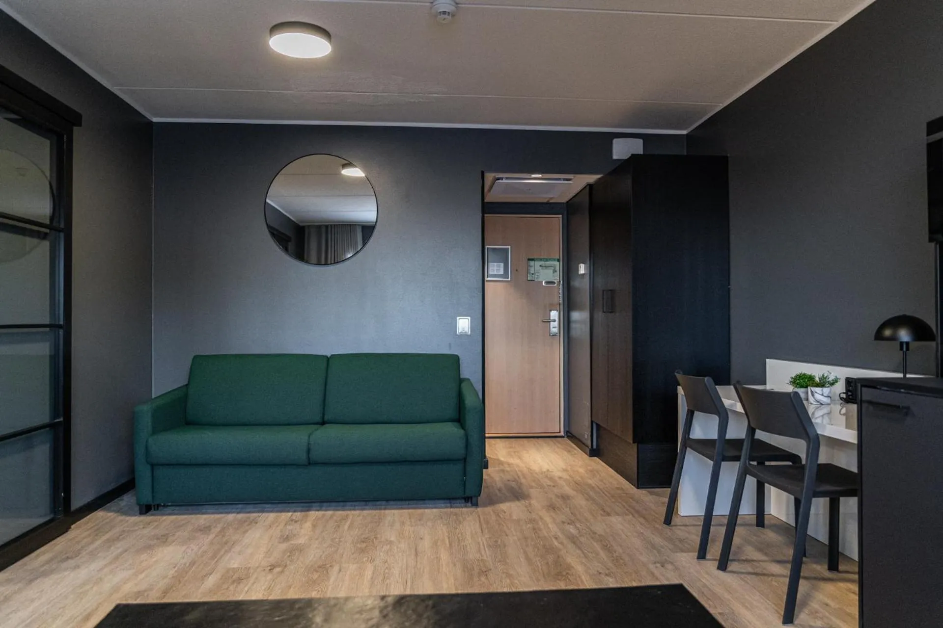 Living room in Hotelli Sointu by UHANDA