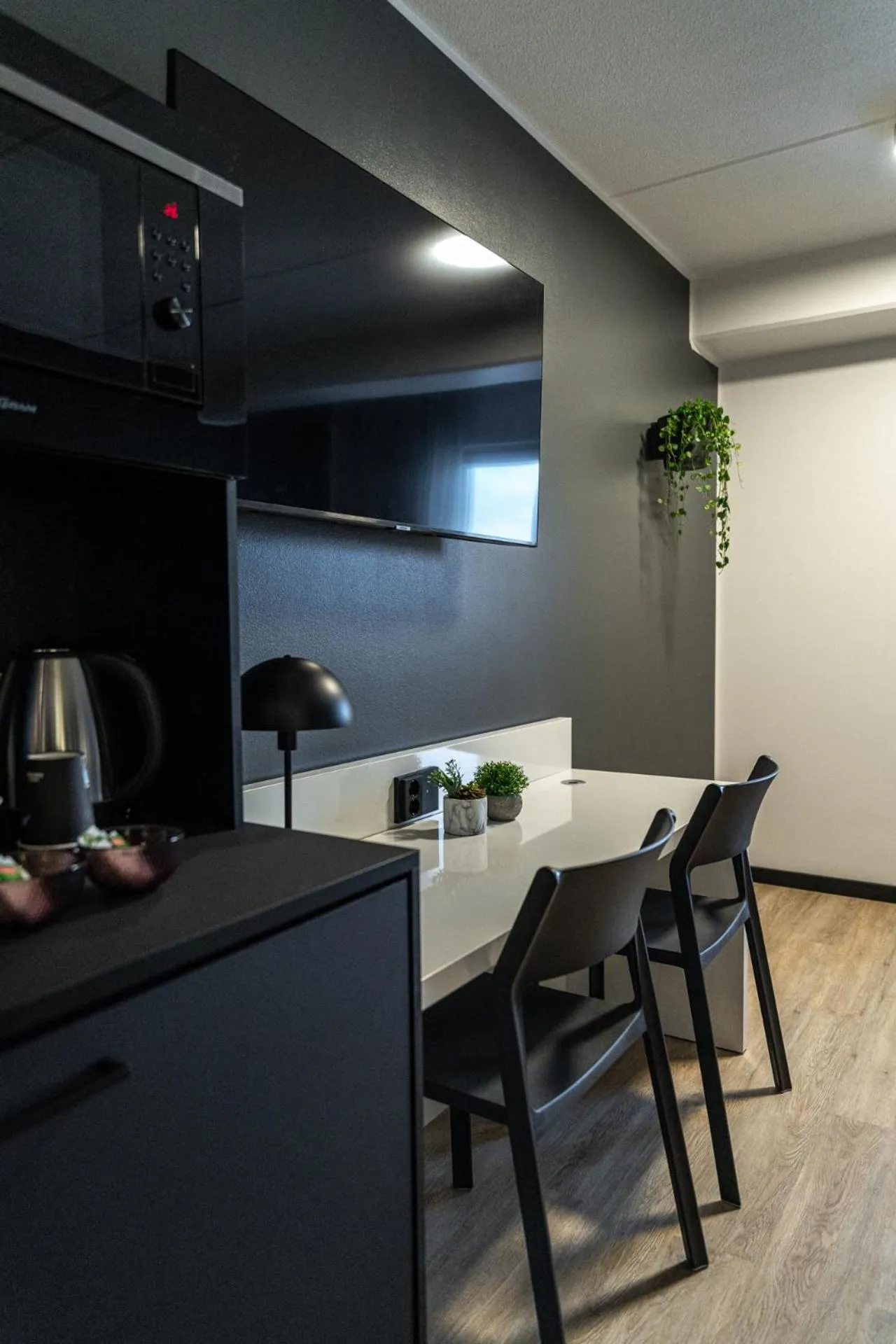 Kitchen or kitchenette in Hotelli Sointu by UHANDA