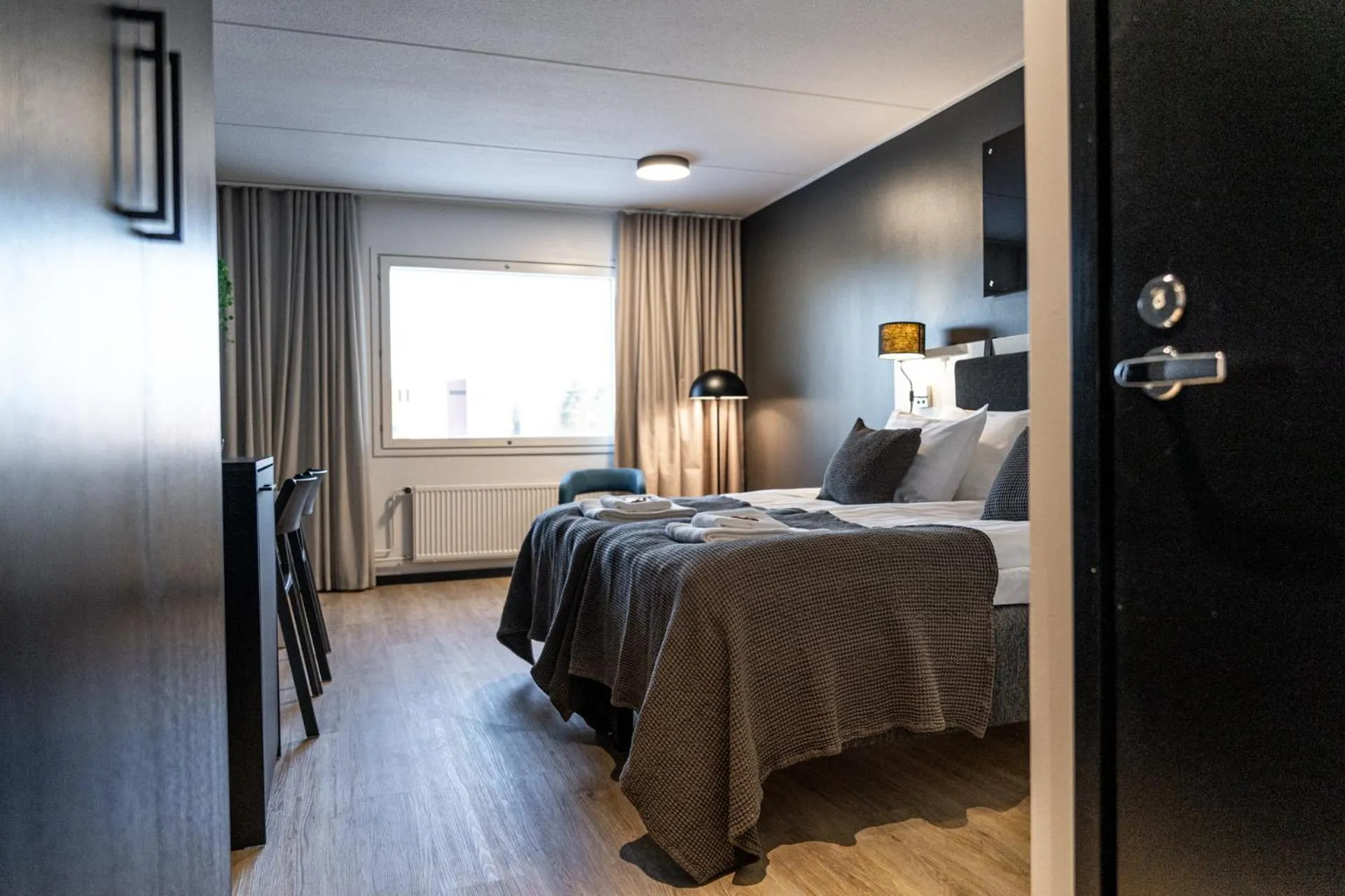 Photo of the whole room, Bed in Hotelli Sointu by UHANDA