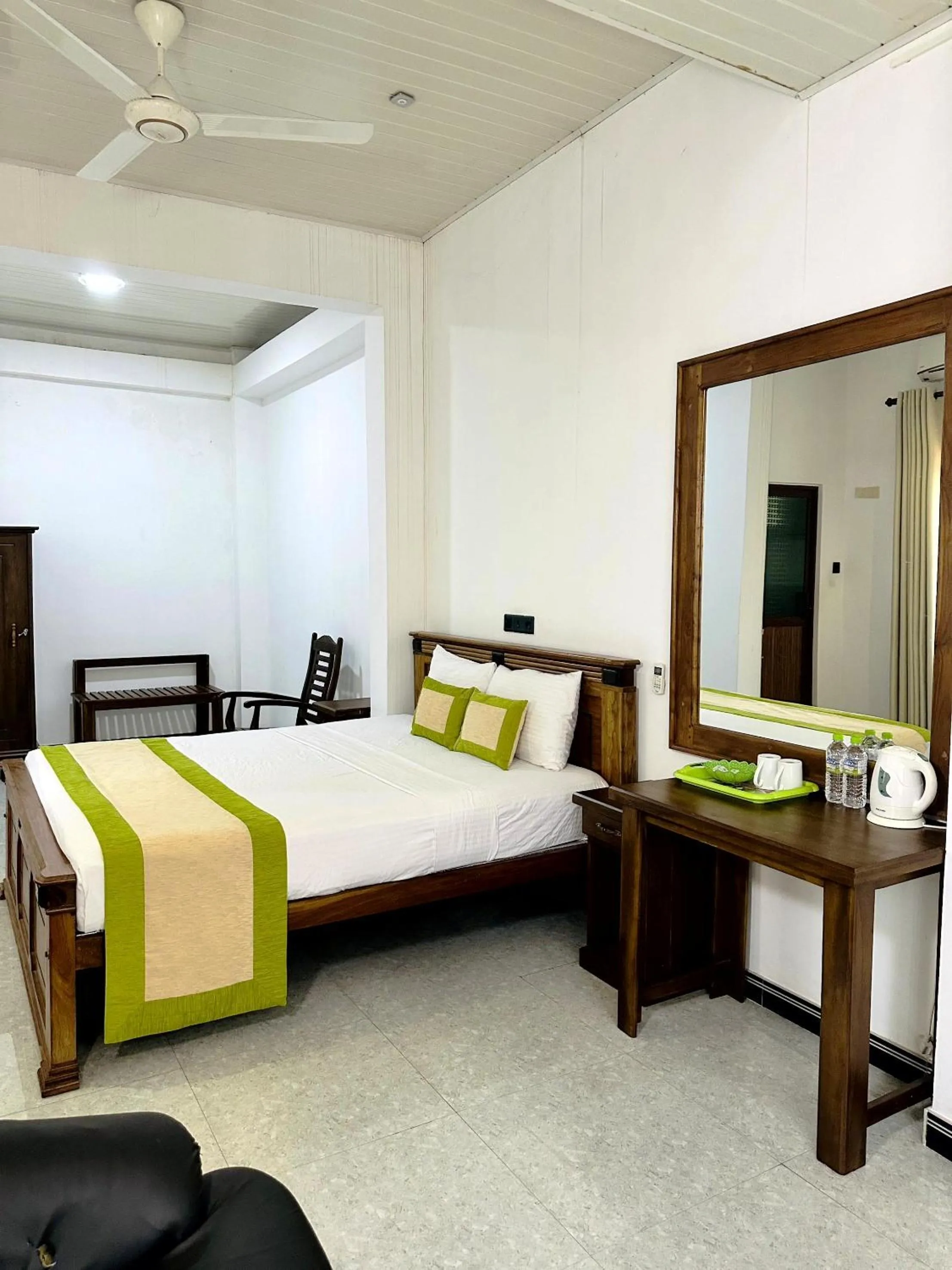 Bed in L S Lanka Hotel Dambulla