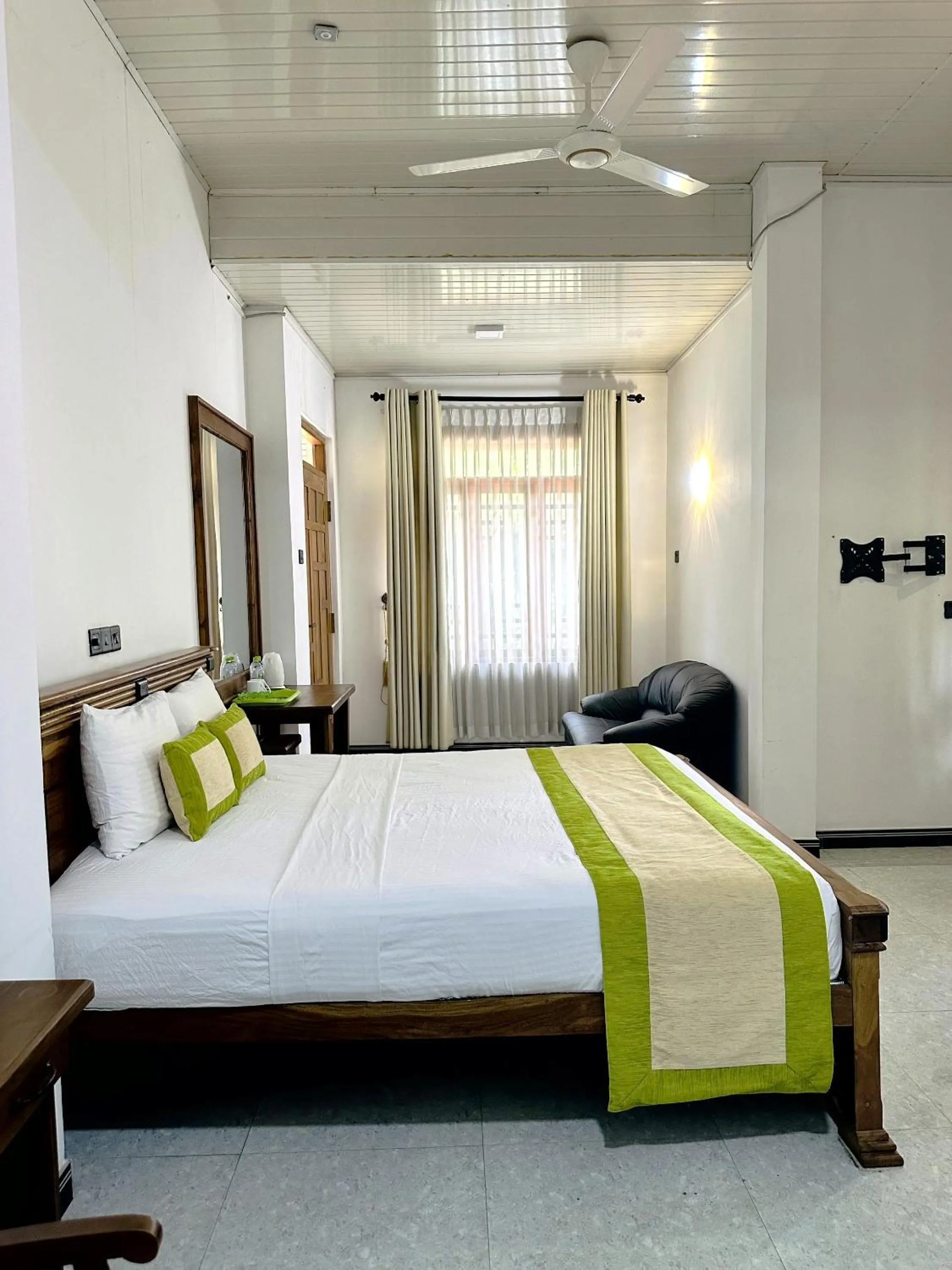 Bed in L S Lanka Hotel Dambulla