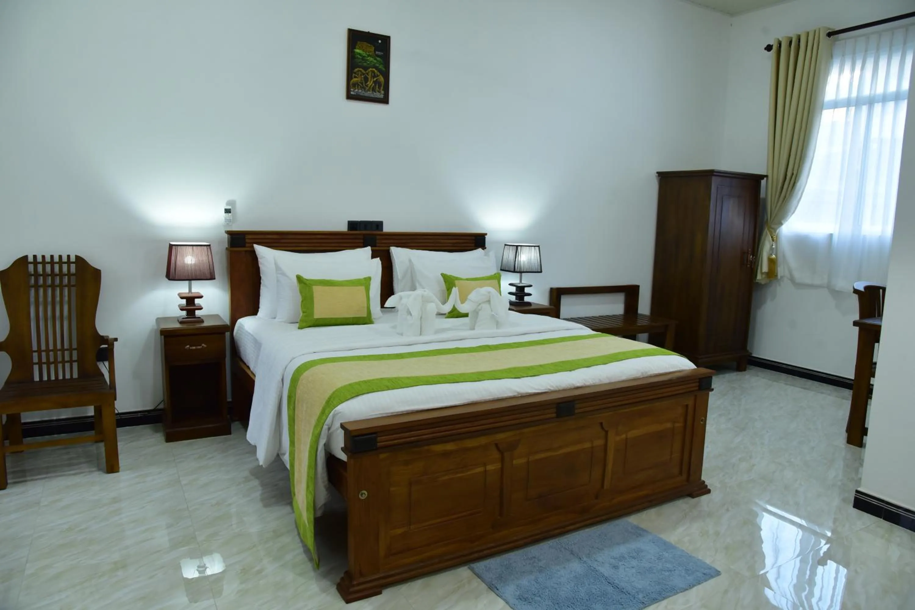 Photo of the whole room, Bed in L S Lanka Hotel Dambulla