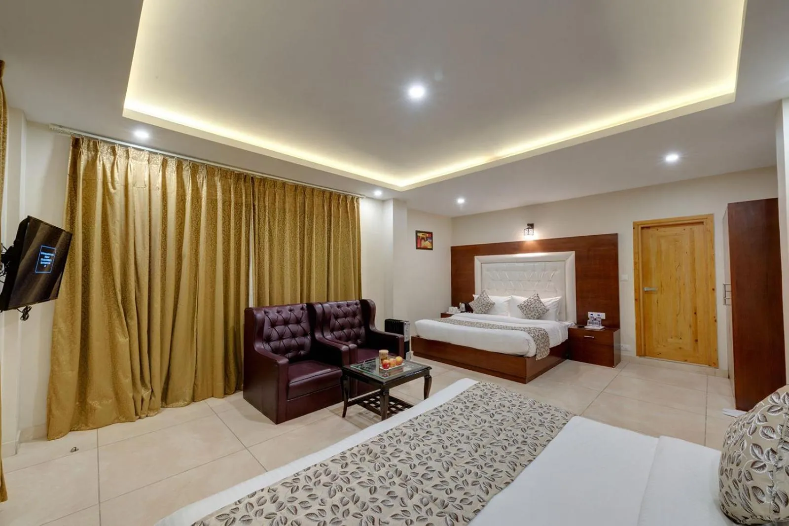 TV and multimedia, Bed in Regenta Place Green Leaf Manali- A Centrally Heated Resort