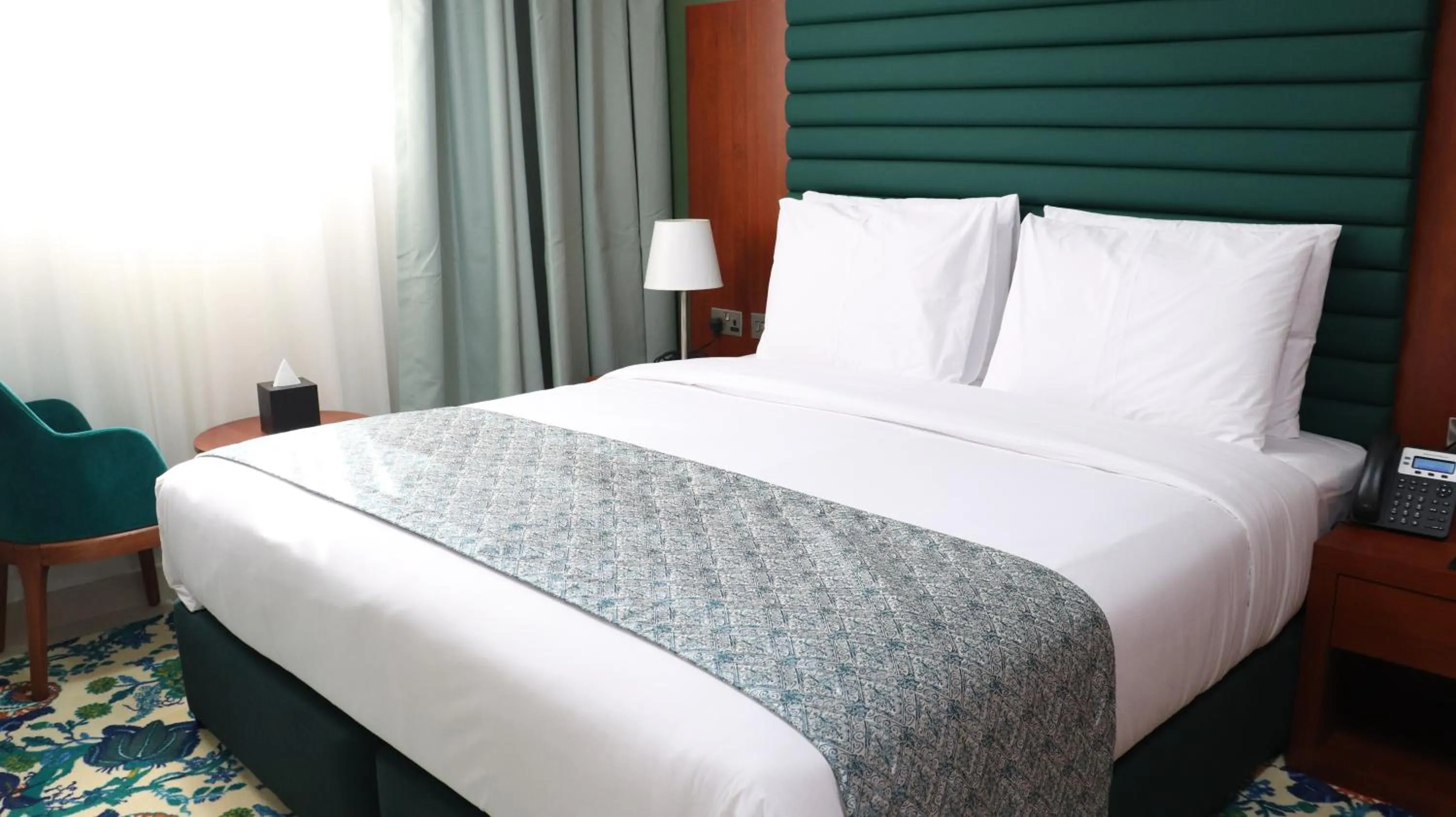 Bed in Al Riyadh Hotel Apartments