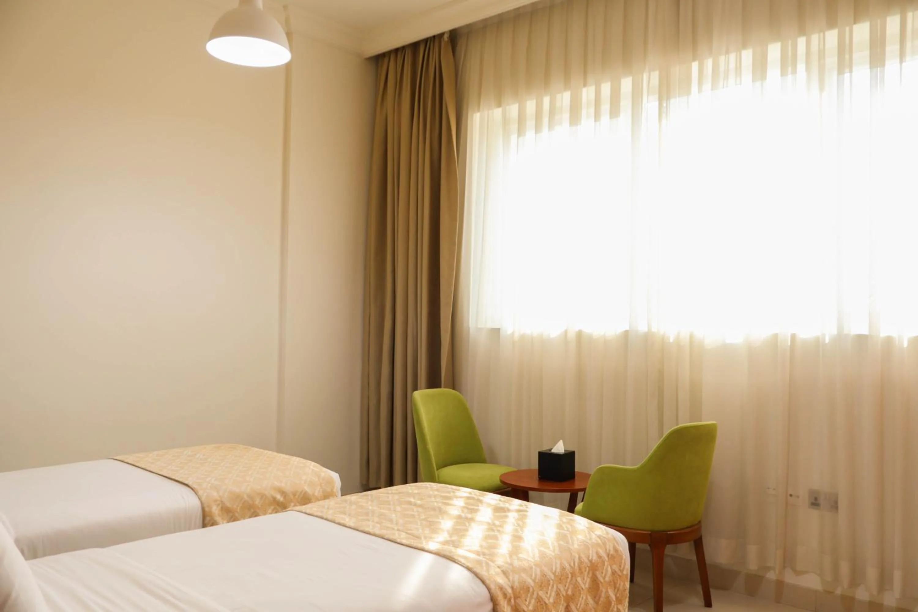 Bed in Al Riyadh Hotel Apartments