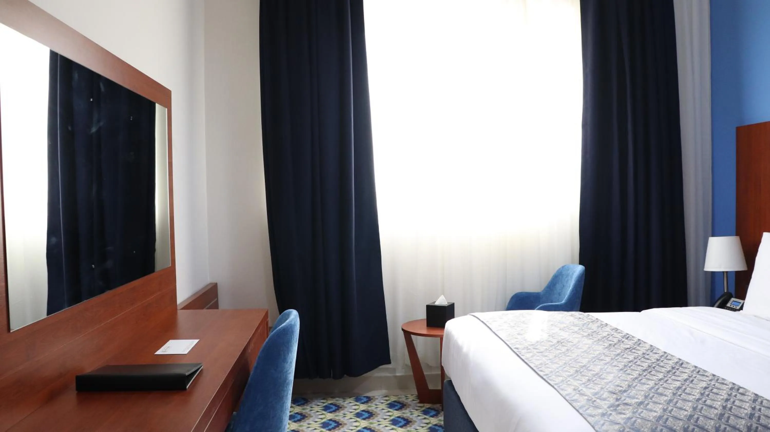 Bed in Al Riyadh Hotel Apartments