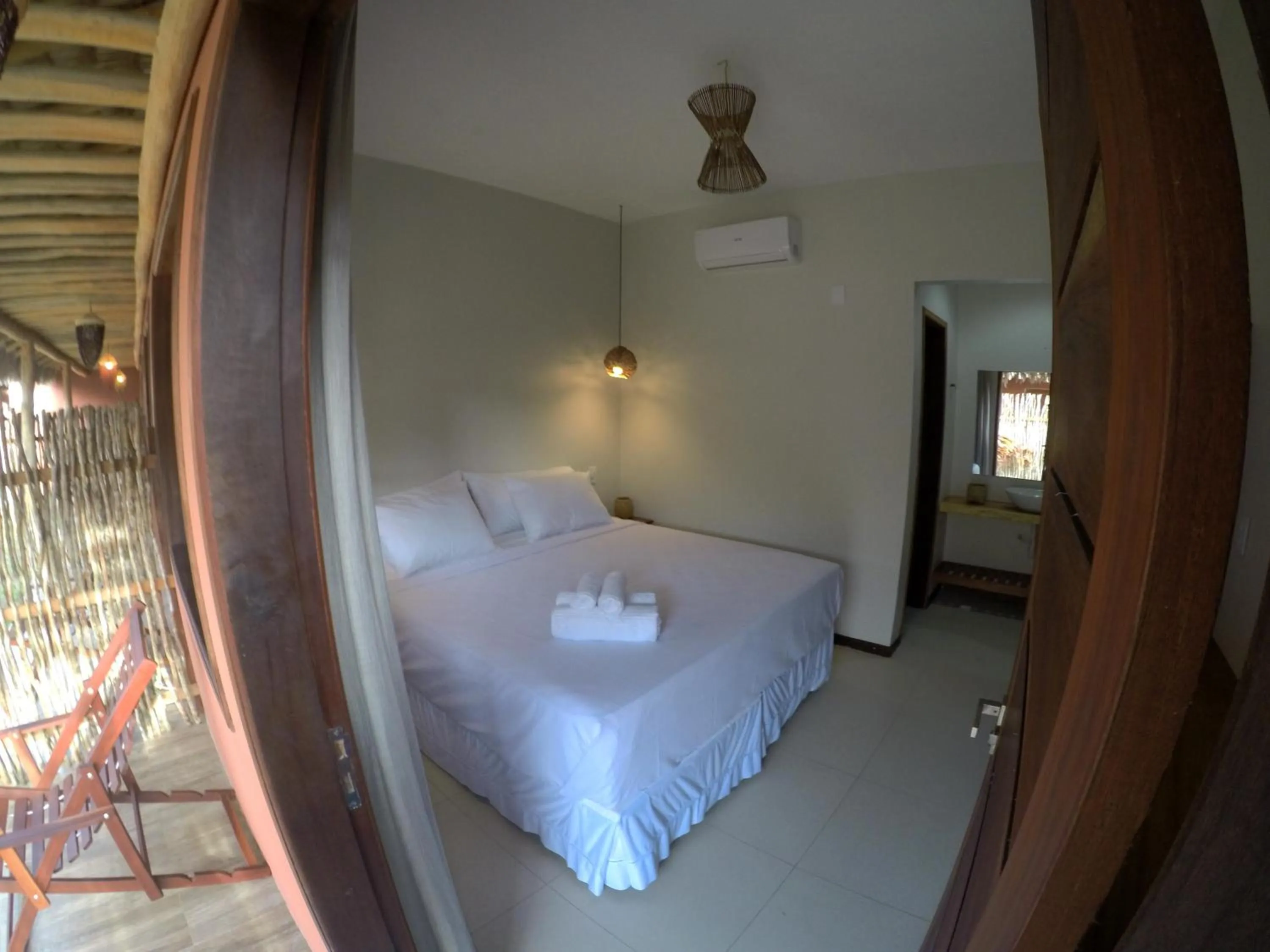 Photo of the whole room, Bed in Pousada Vila Camurim
