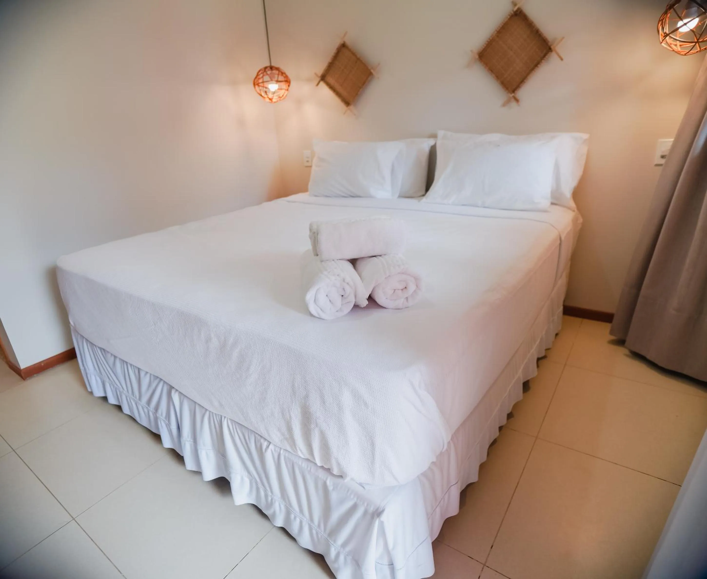 Bed in Pousada Vila Camurim