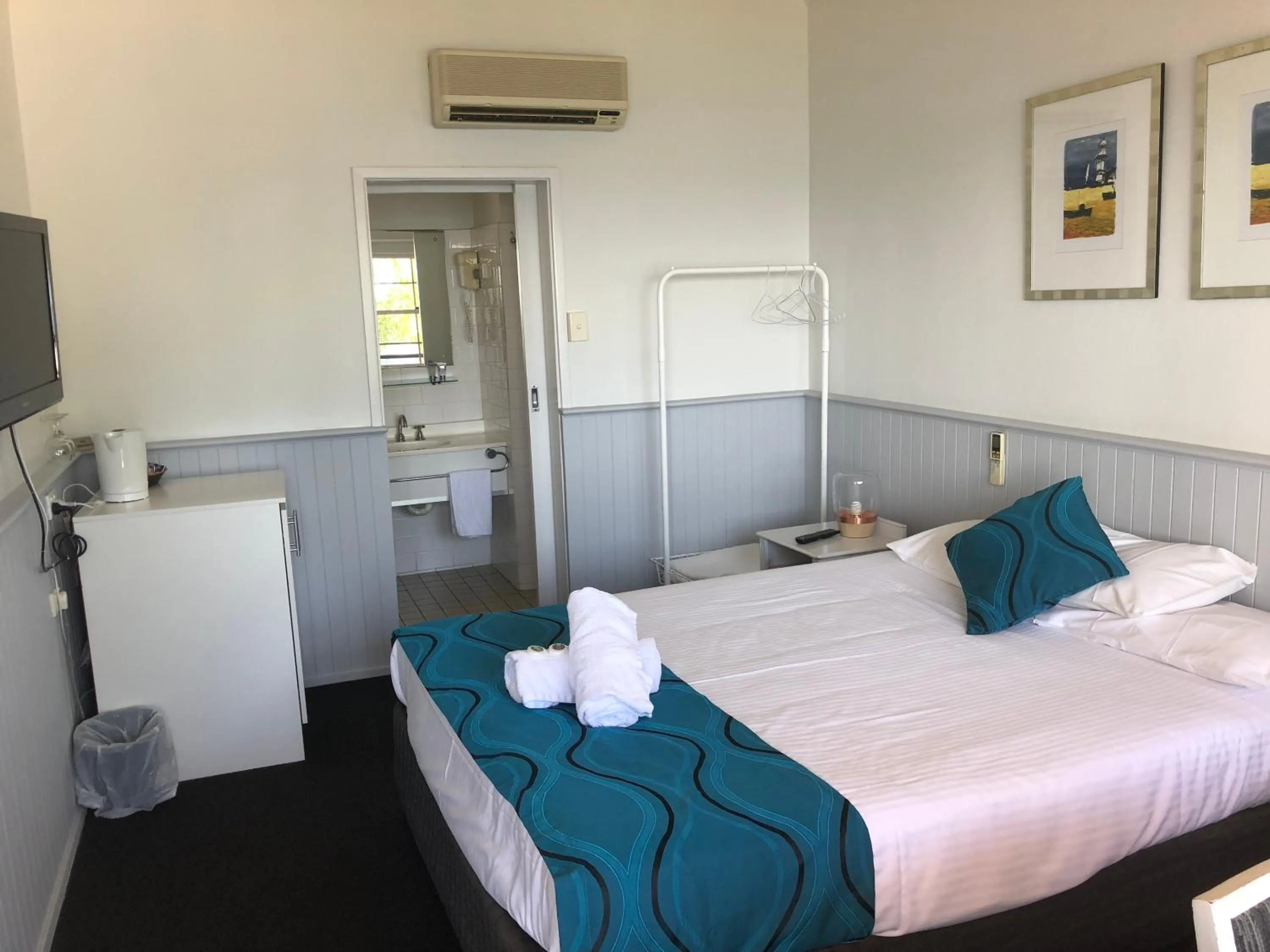 Bed in Squid's Ink Motel