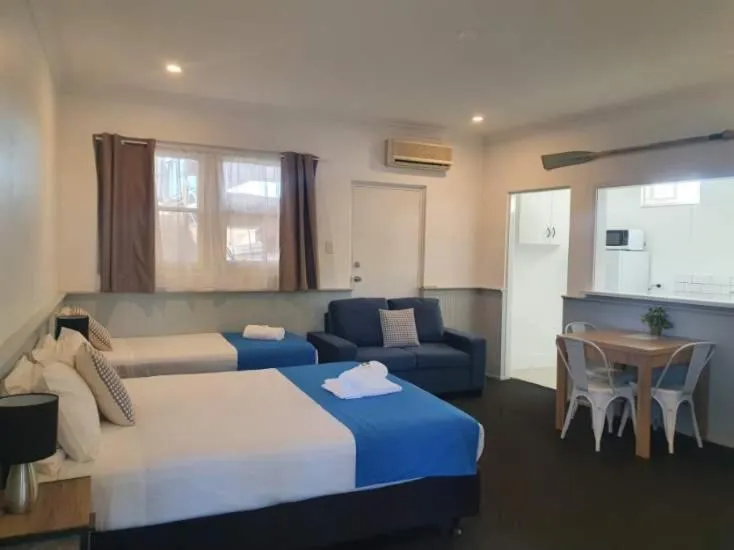 Bed in Squid's Ink Motel