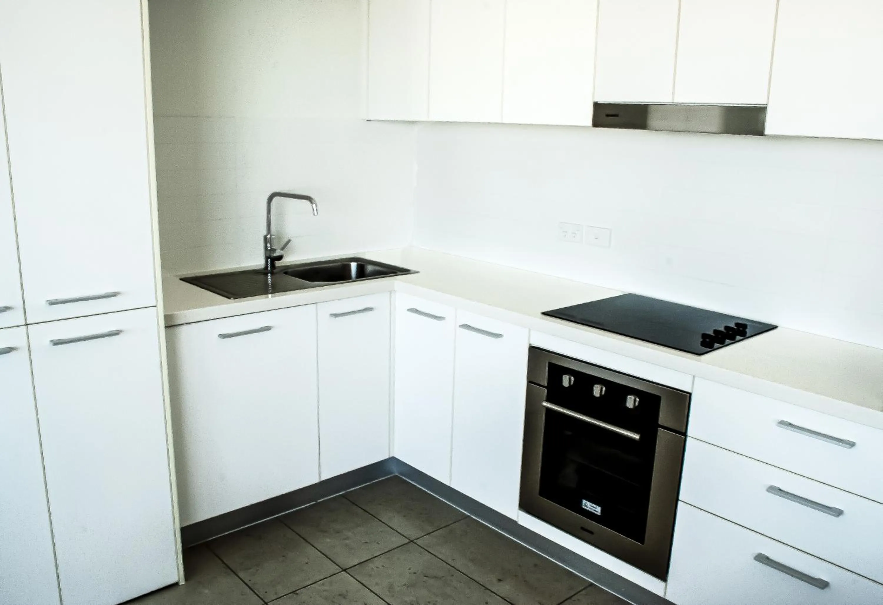 Kitchen or kitchenette in Oshen Holiday Apartments Yeppoon