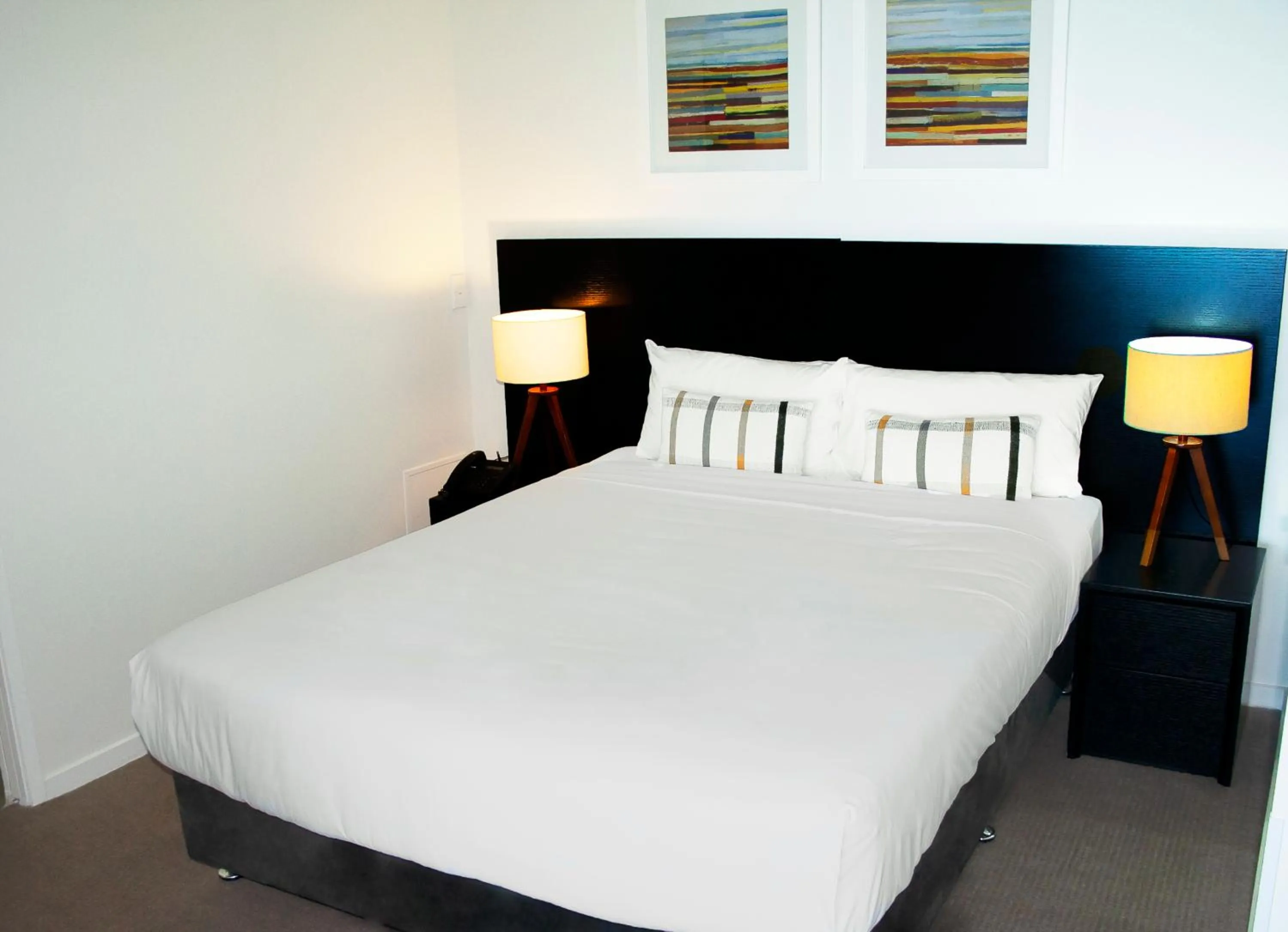 Bed in Oshen Holiday Apartments Yeppoon