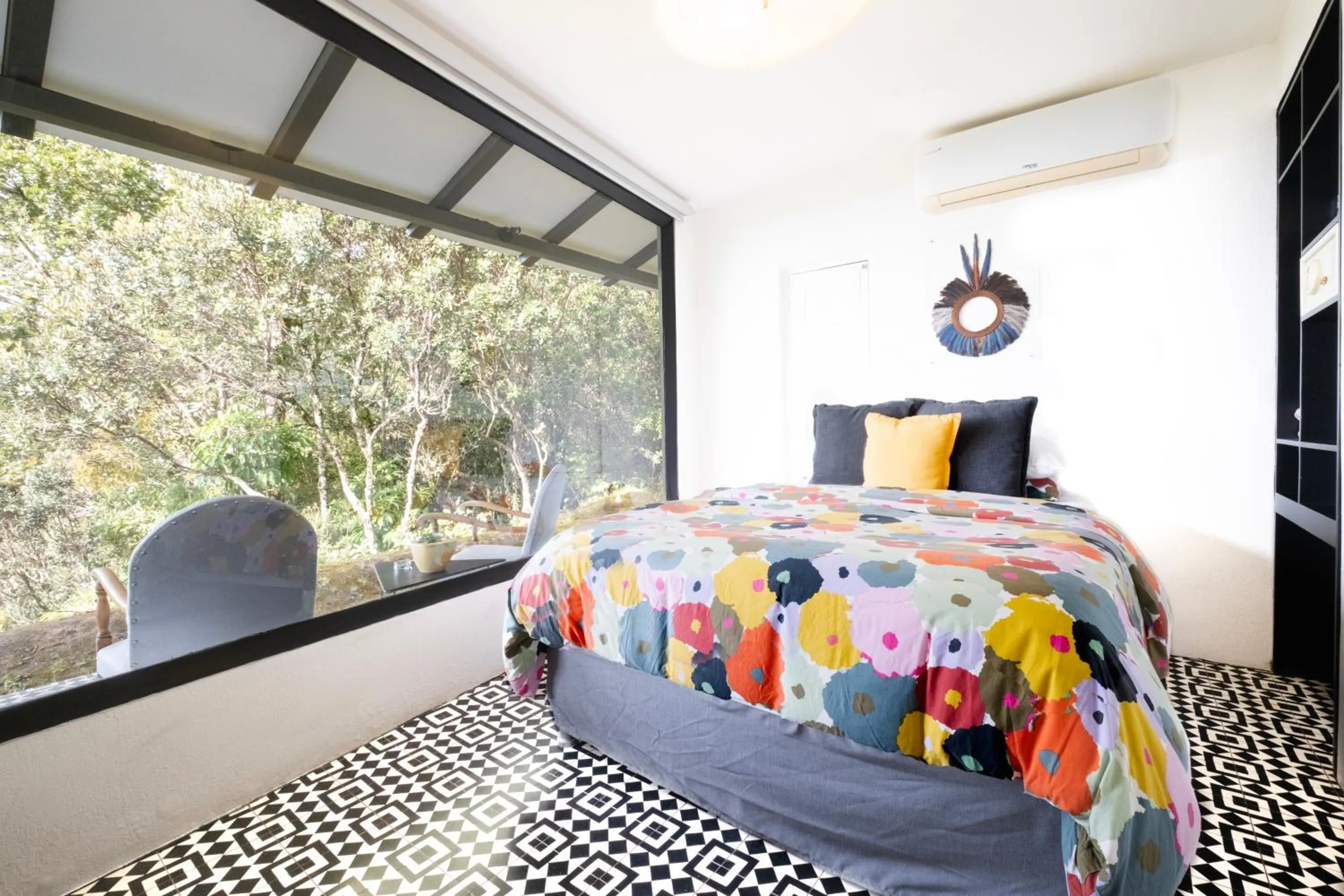 Bed in Dantica Cloud Forest Lodge