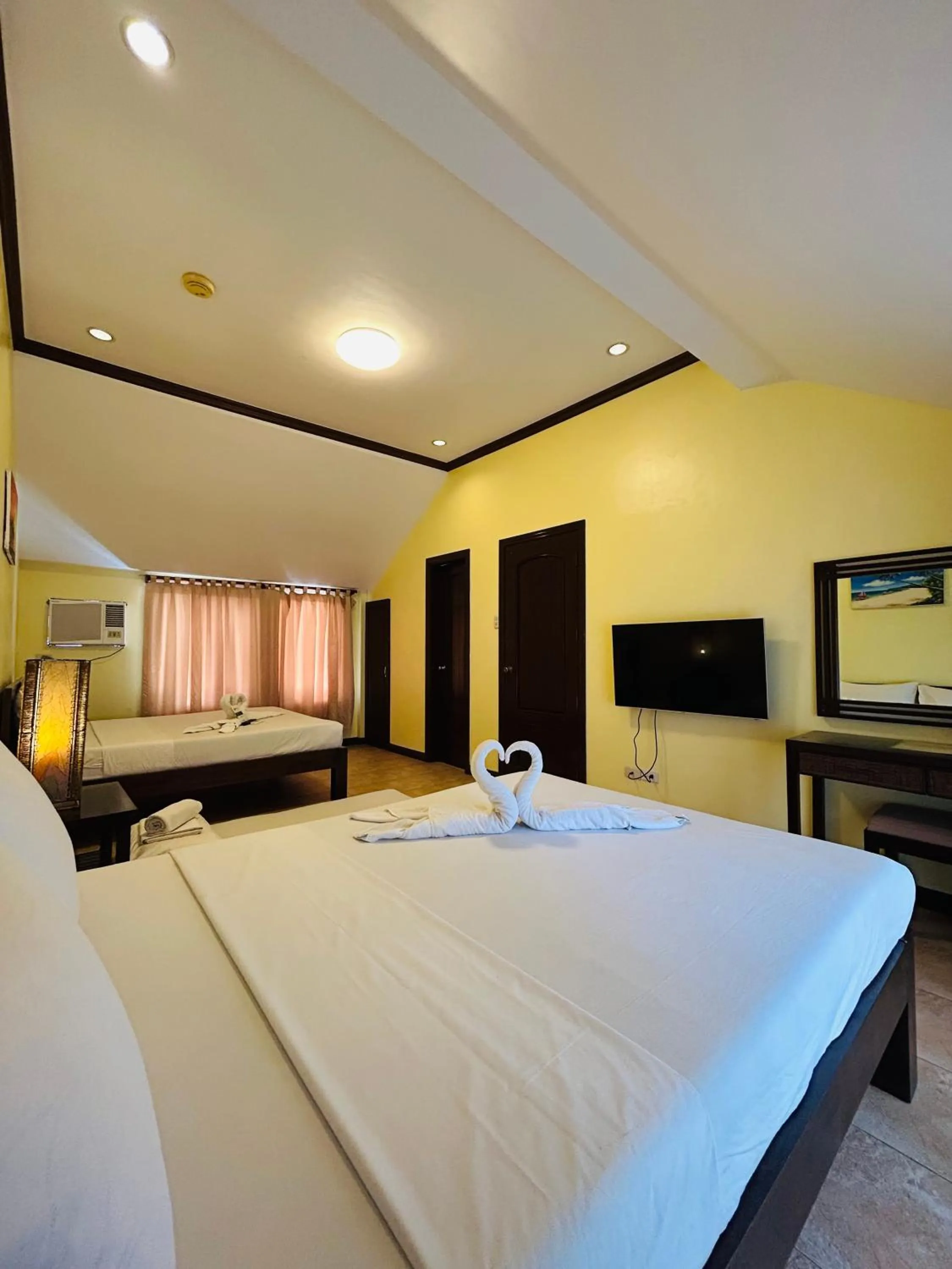 Bed in Sheridan Villas Boracay