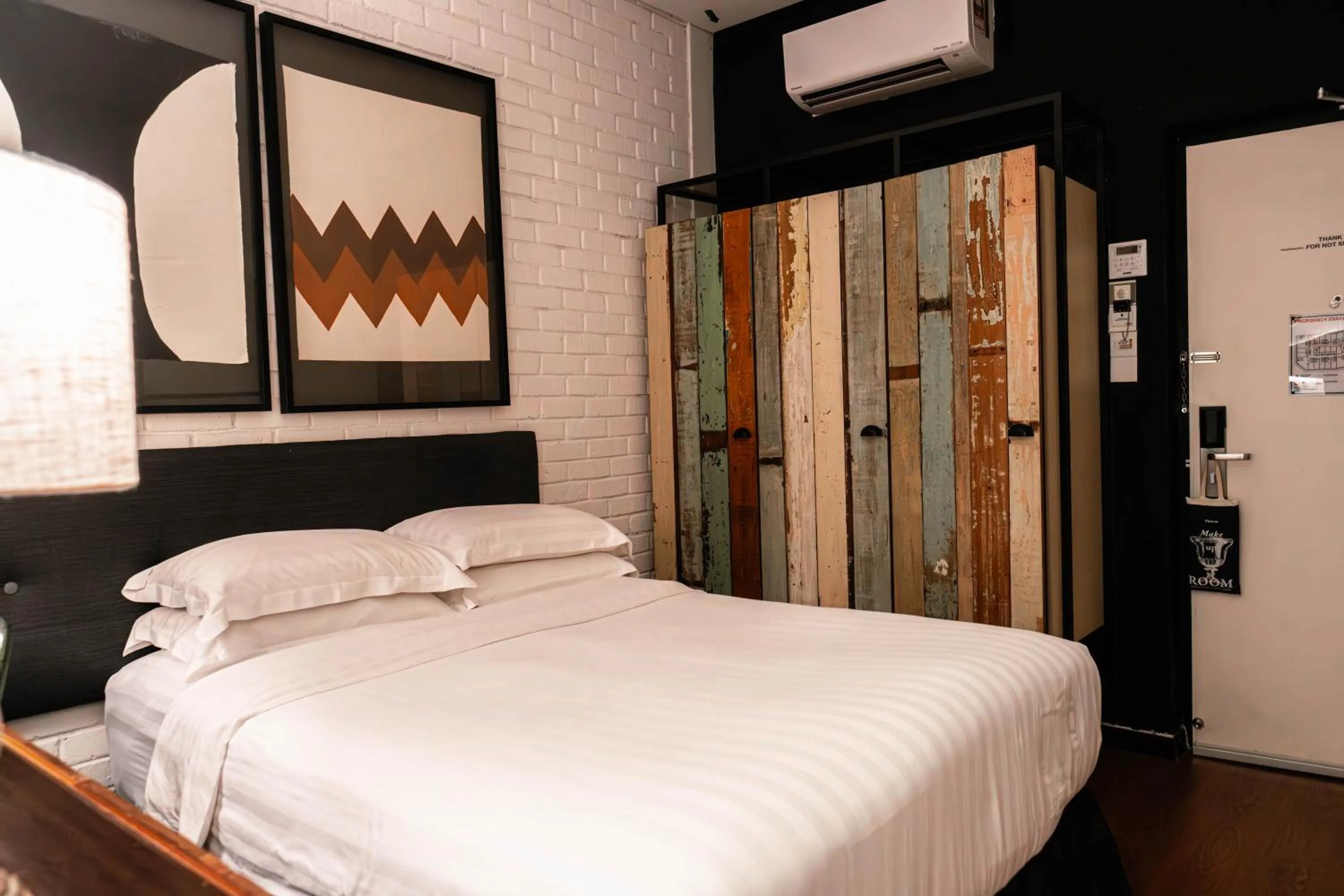 Bed in M Boutique Hotel