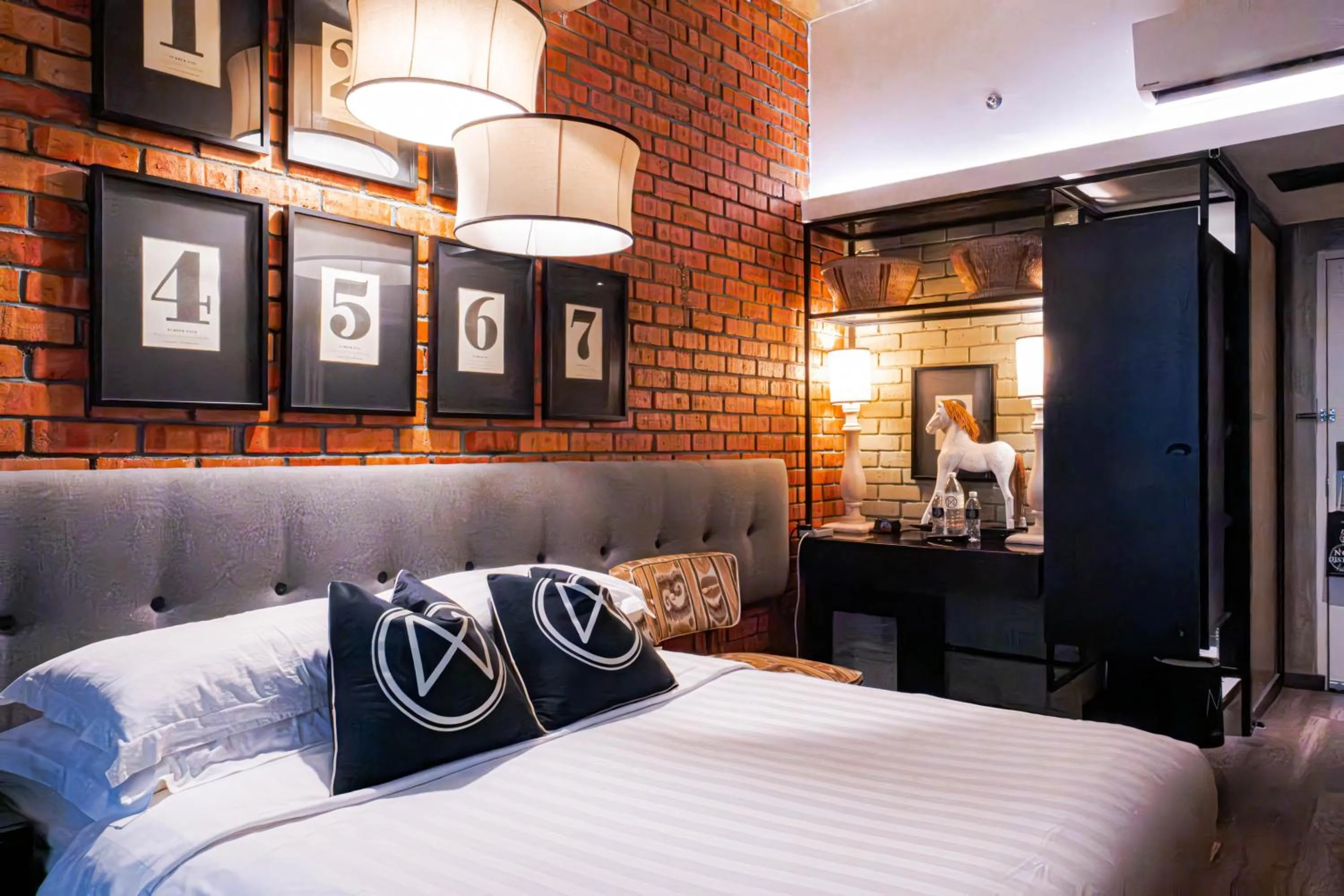 Bed in M Boutique Hotel