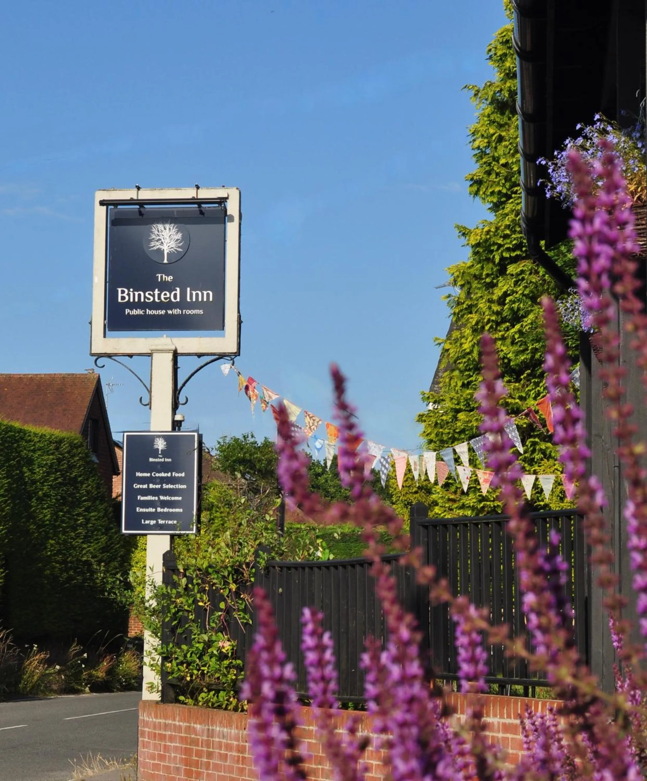 Property logo or sign in The Binsted Inn