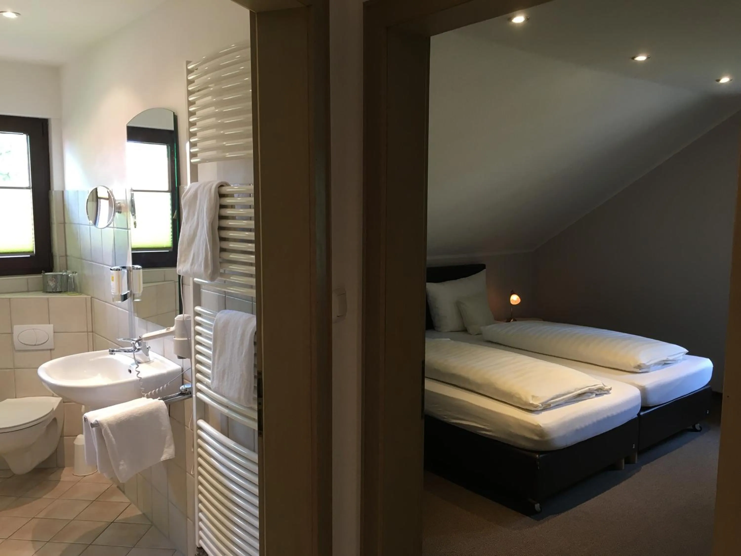 Bathroom, Bed in Landhaus Hotel Göke