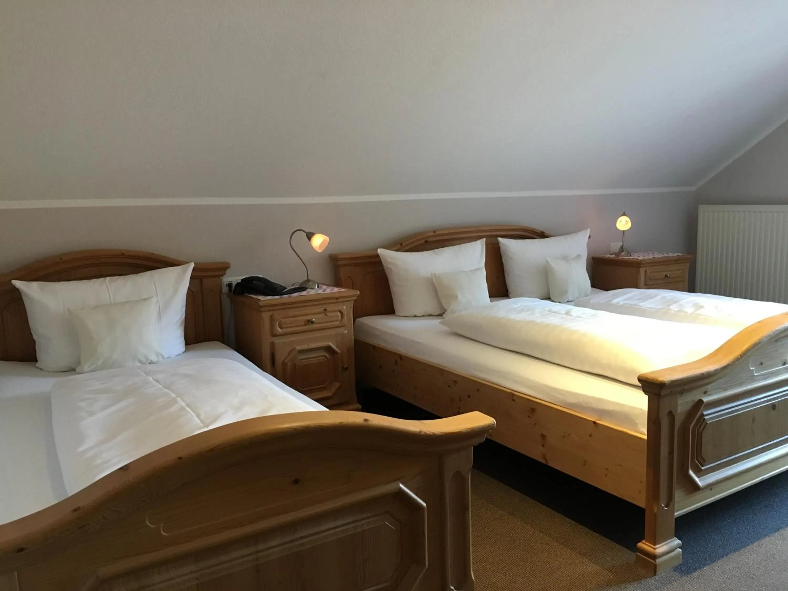 Photo of the whole room, Bed in Landhaus Hotel Göke
