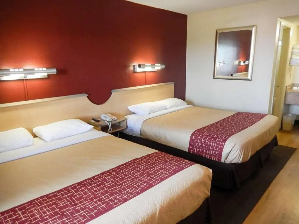 Bed in Travelodge by Wyndham San Antonio Lackland AFB North