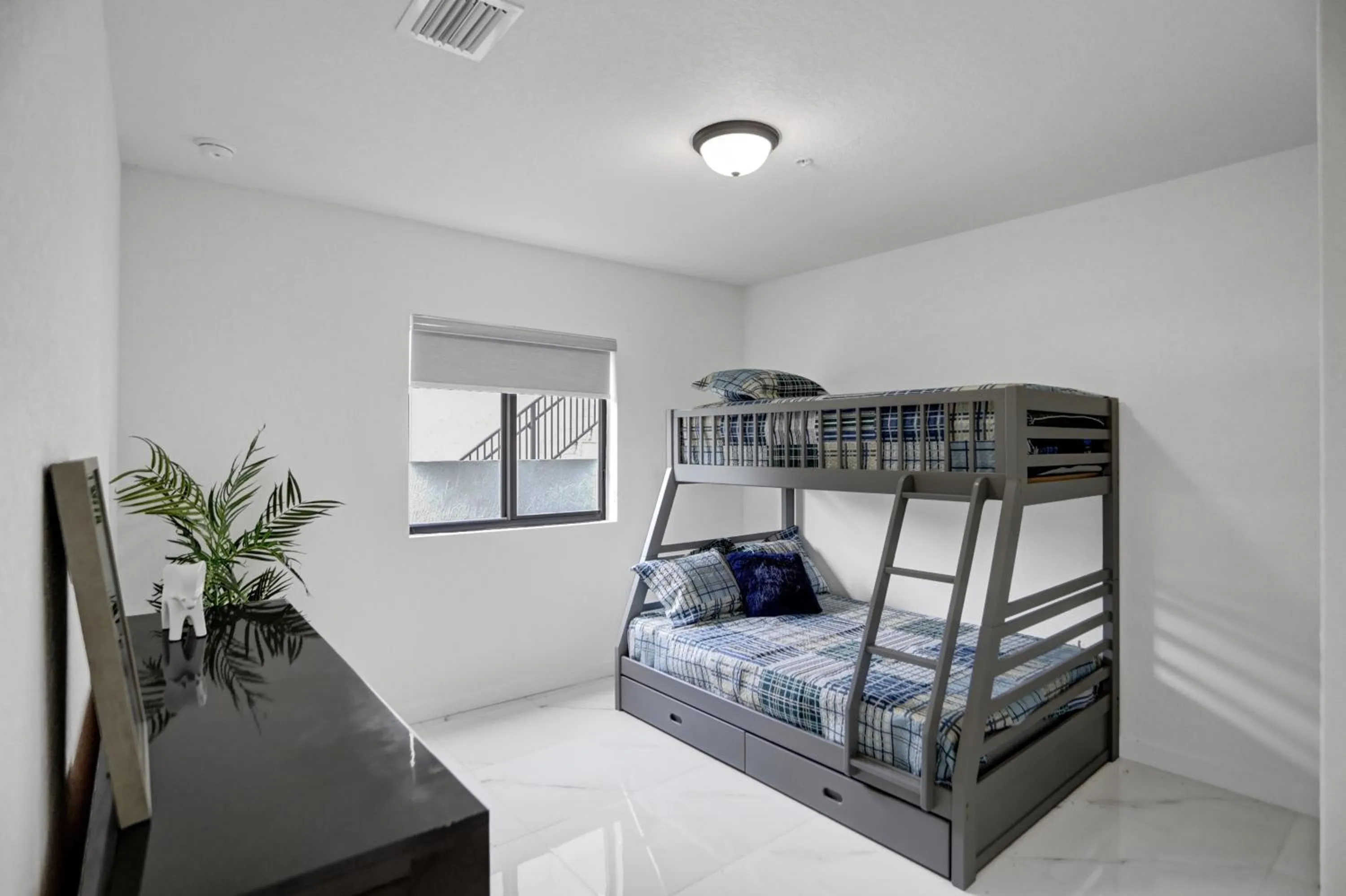 Decorative detail, Bed in Renzzi Wynwood Apartments