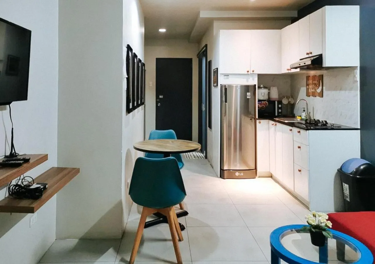 Bedroom, Kitchen/Kitchenette in GMRENTALS Apartment at Mactan Airport