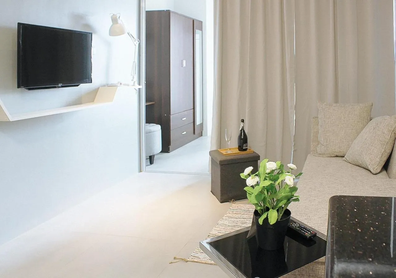 Bedroom, TV/Entertainment Center in GMRENTALS Apartment at Mactan Airport
