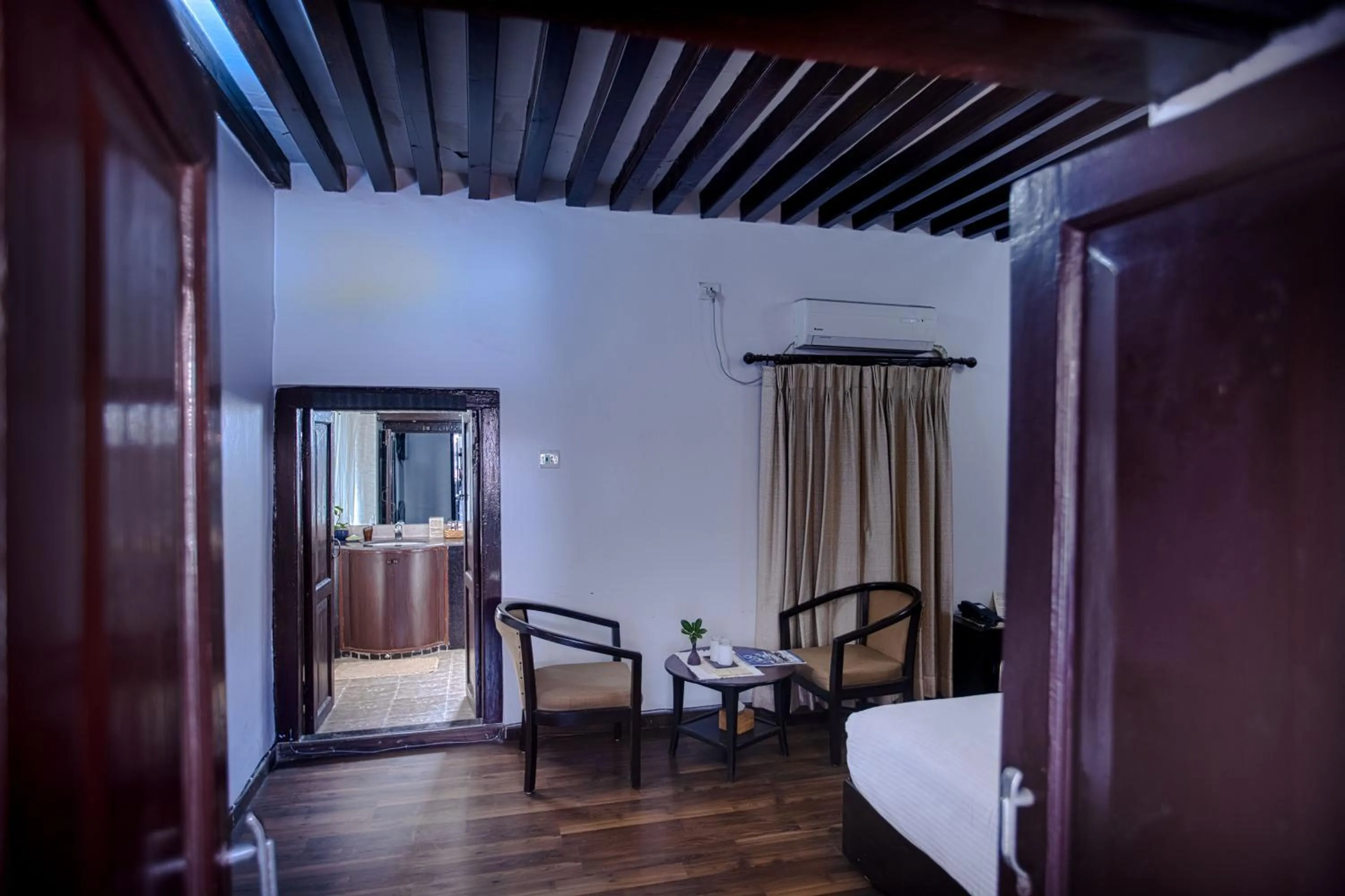 Photo of the whole room, Bed in Hukum Darbar Restaurant & Hotel