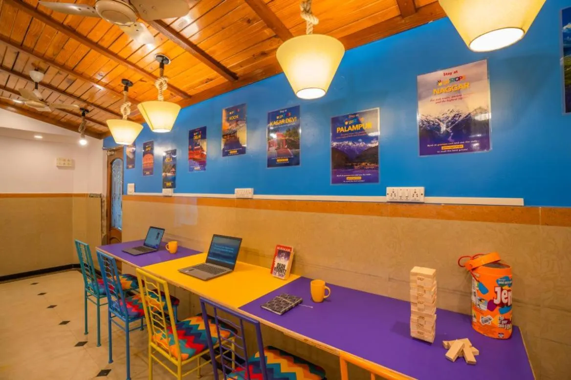 Seating area in goSTOPS Bengaluru, Gandhi Nagar Majestic