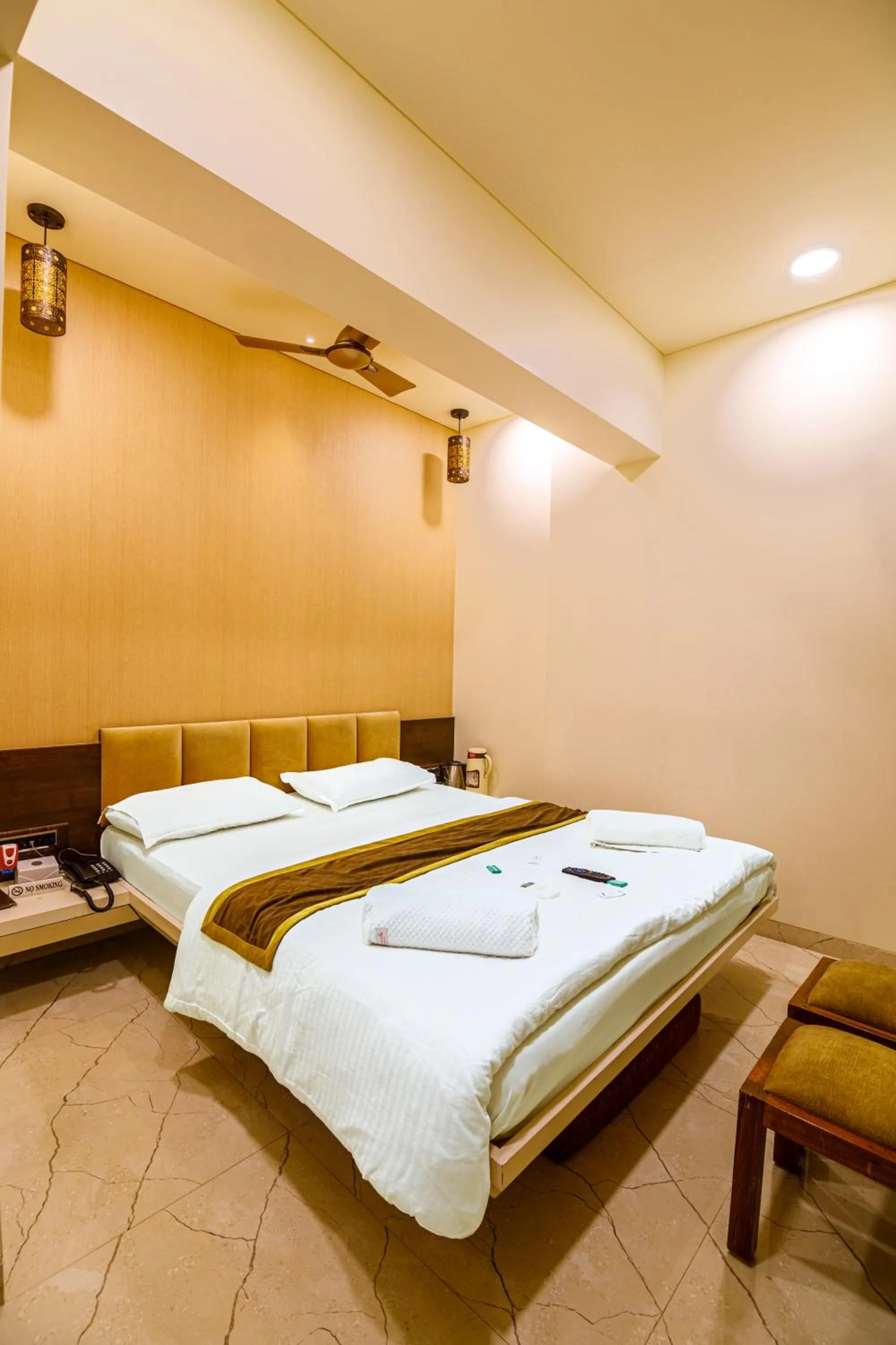 Bed in La Hotel Metro near BKC