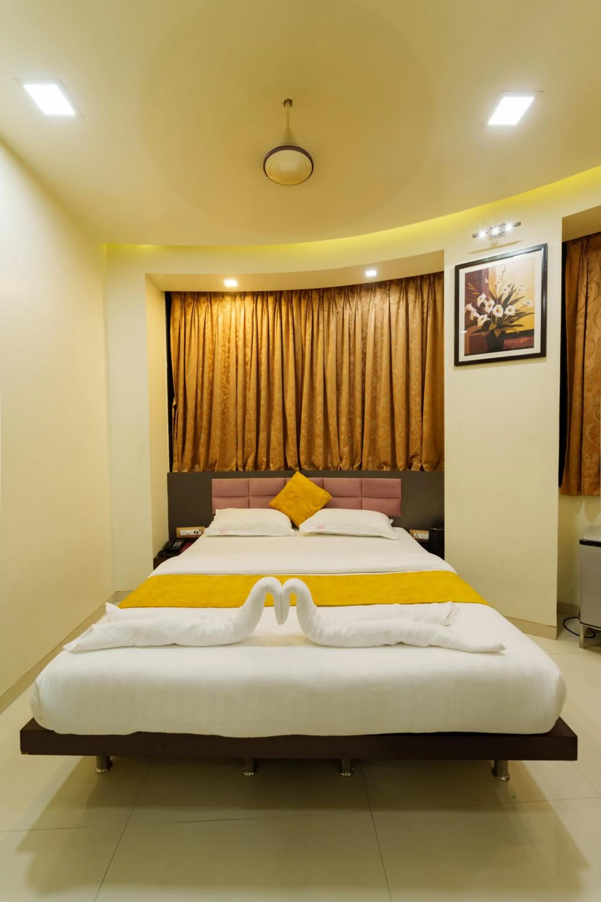 Bed in La Hotel Metro near BKC