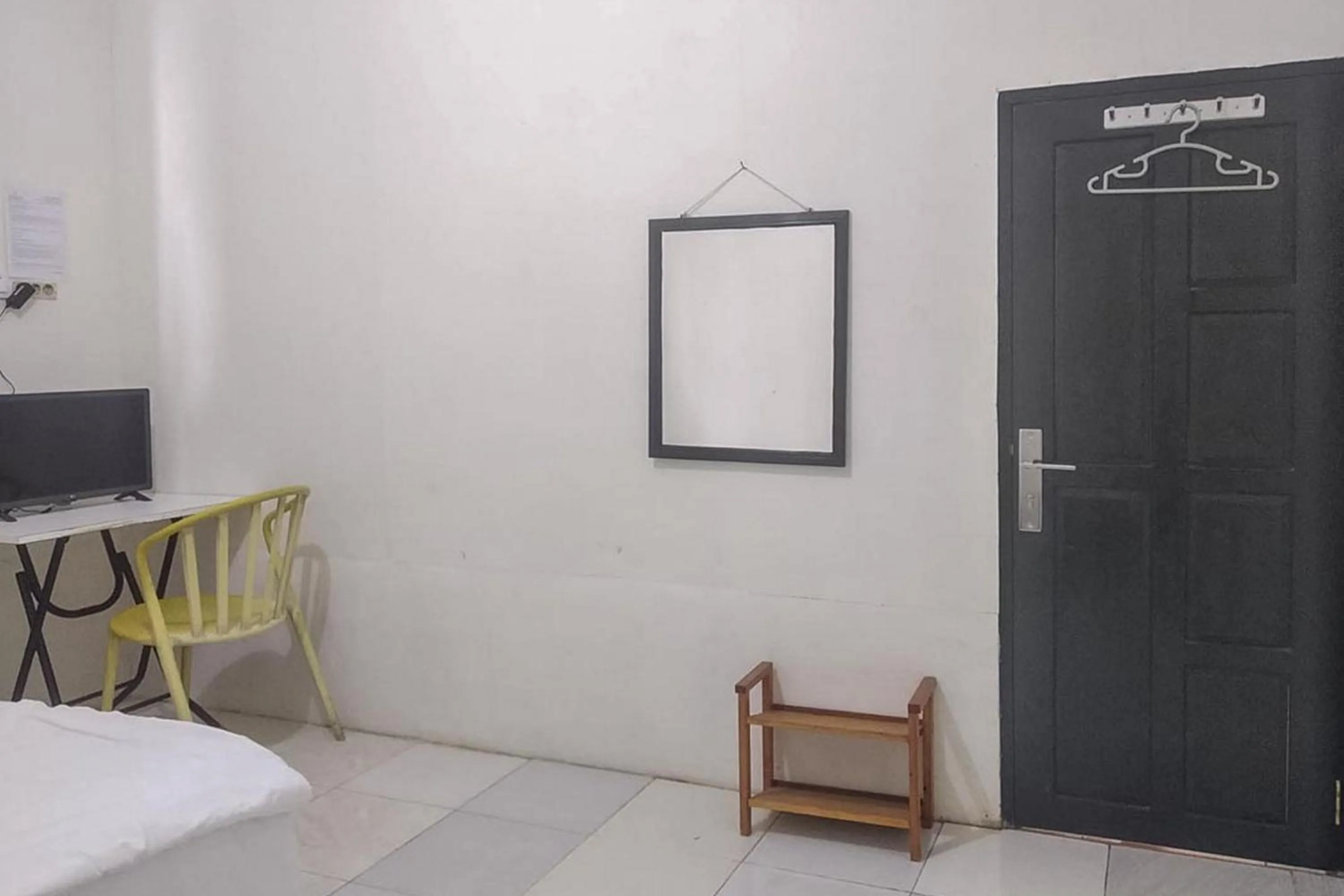 Bed in Nayla Homestay Jambi Mitra RedDoorz