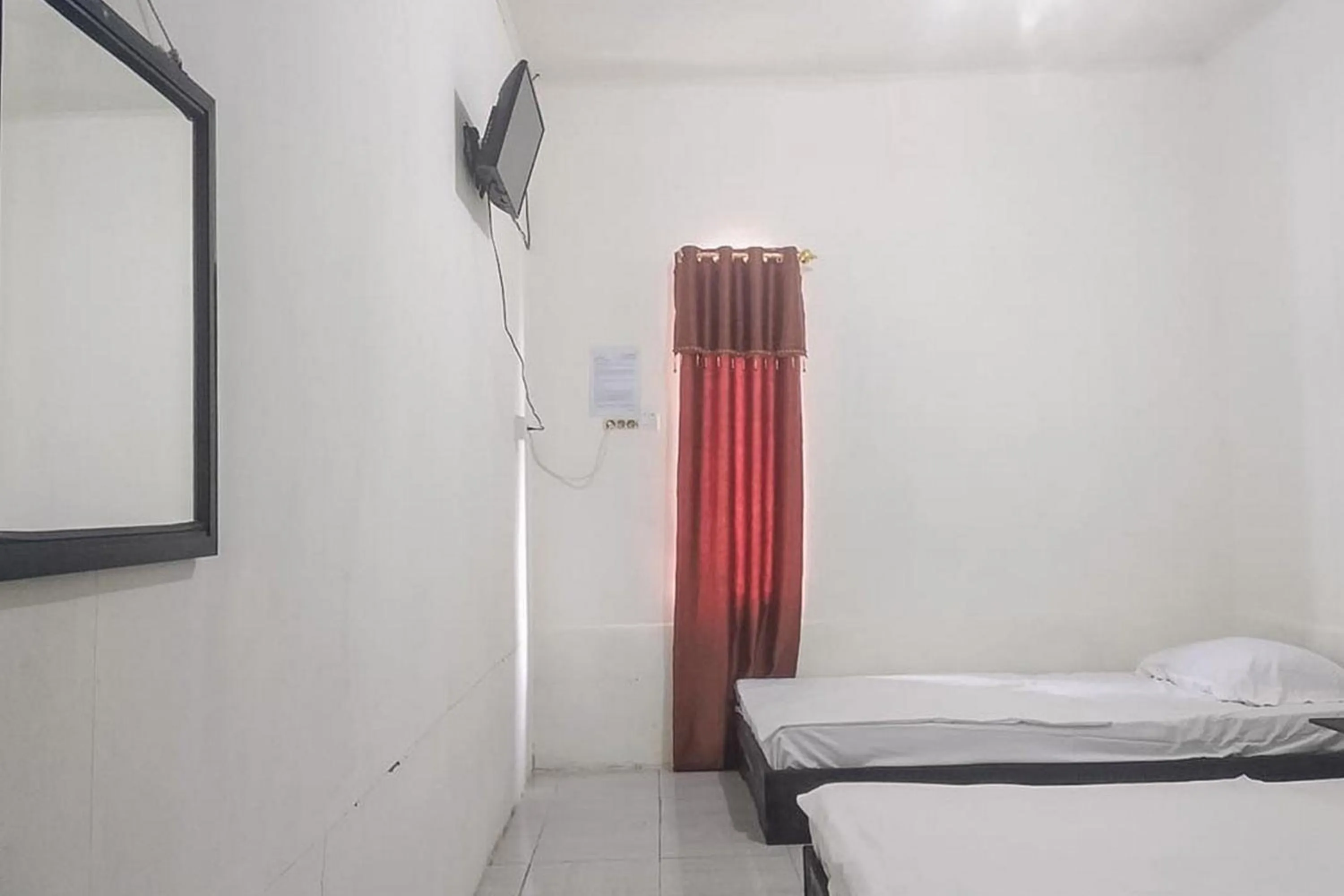 Bed in Nayla Homestay Jambi Mitra RedDoorz