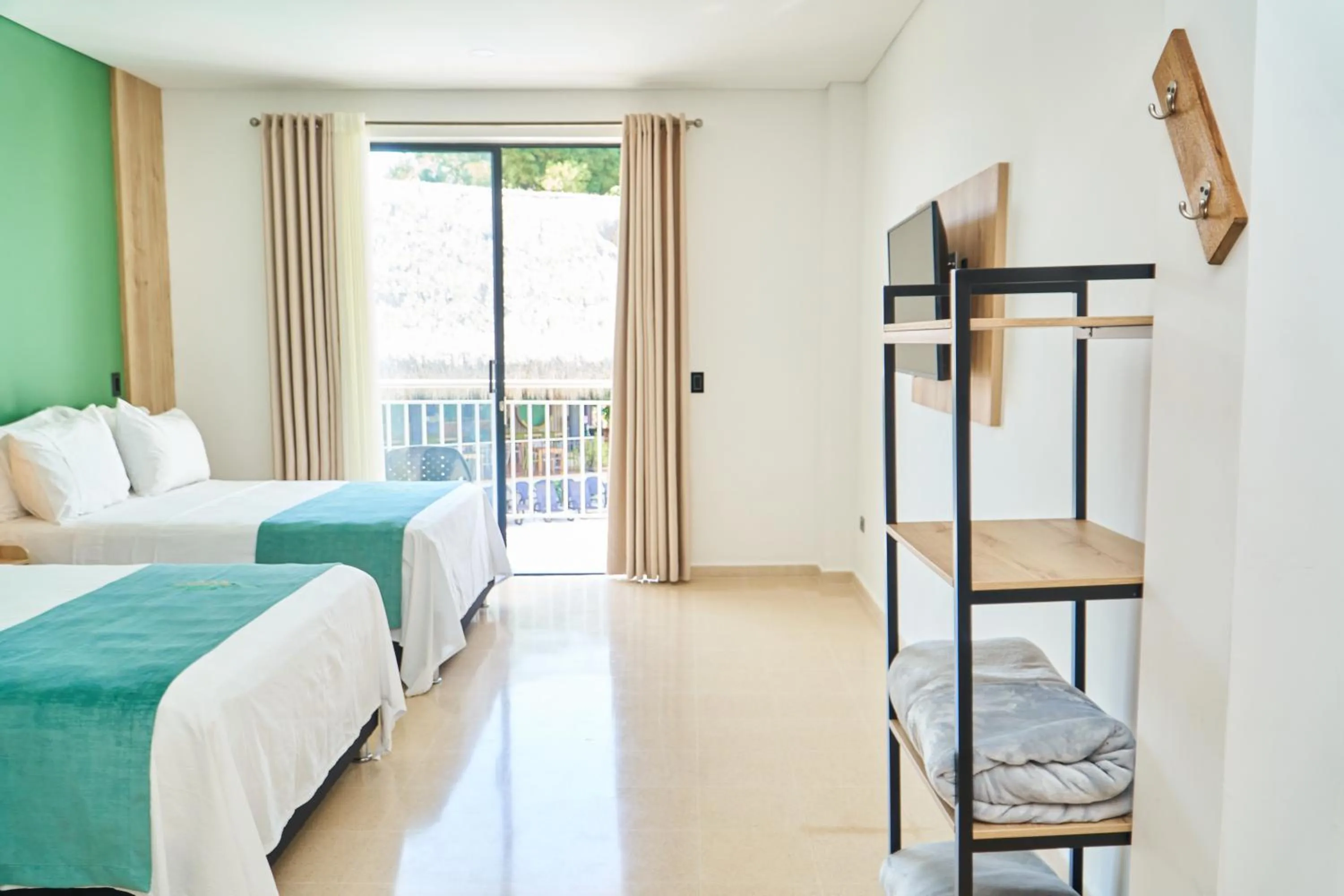 Photo of the whole room, Bed in Hotel Arbóreo Doradal