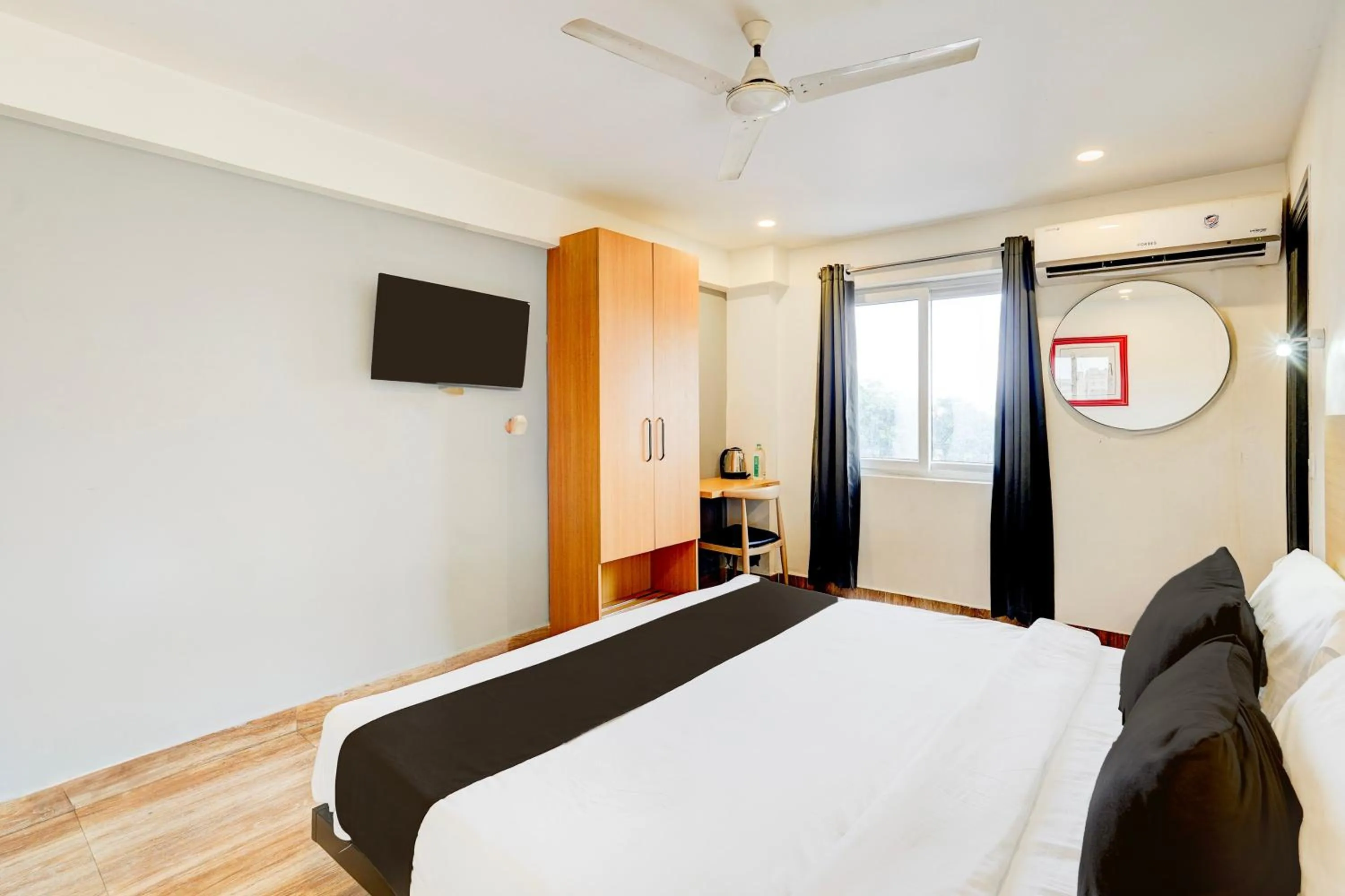 Bedroom, Bed in Super Townhouse Tirupati