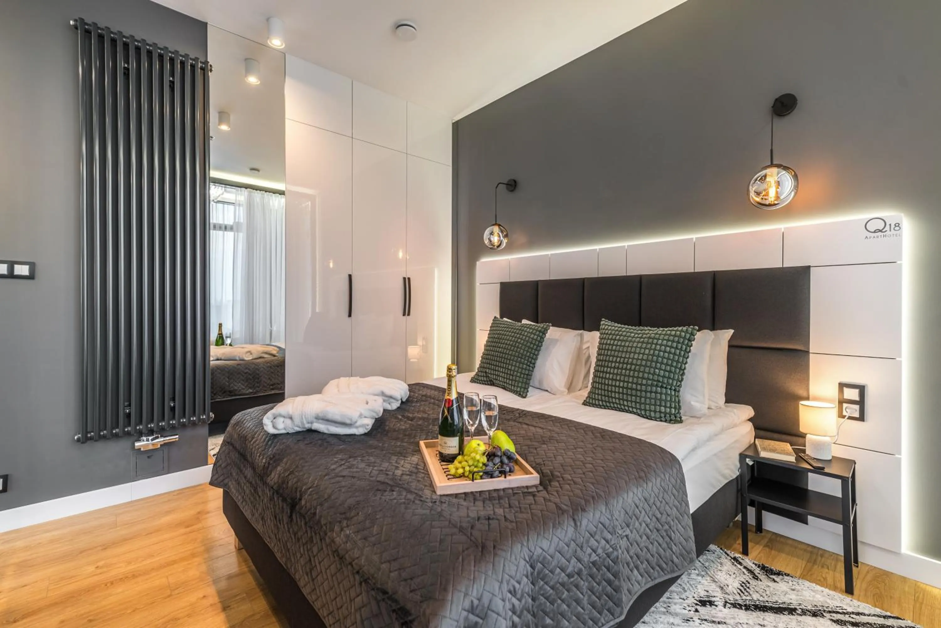 Bed in Q18 ApartHotel