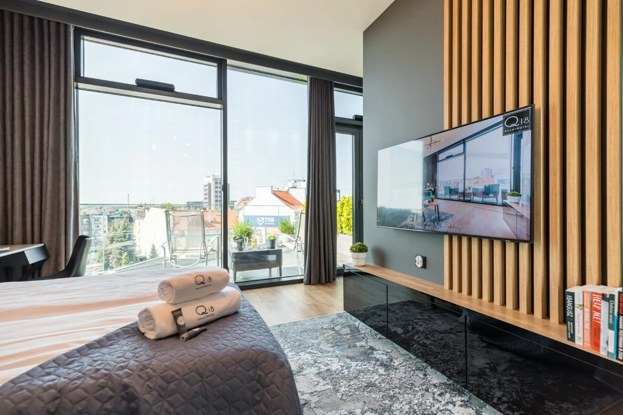 Bed in Q18 ApartHotel