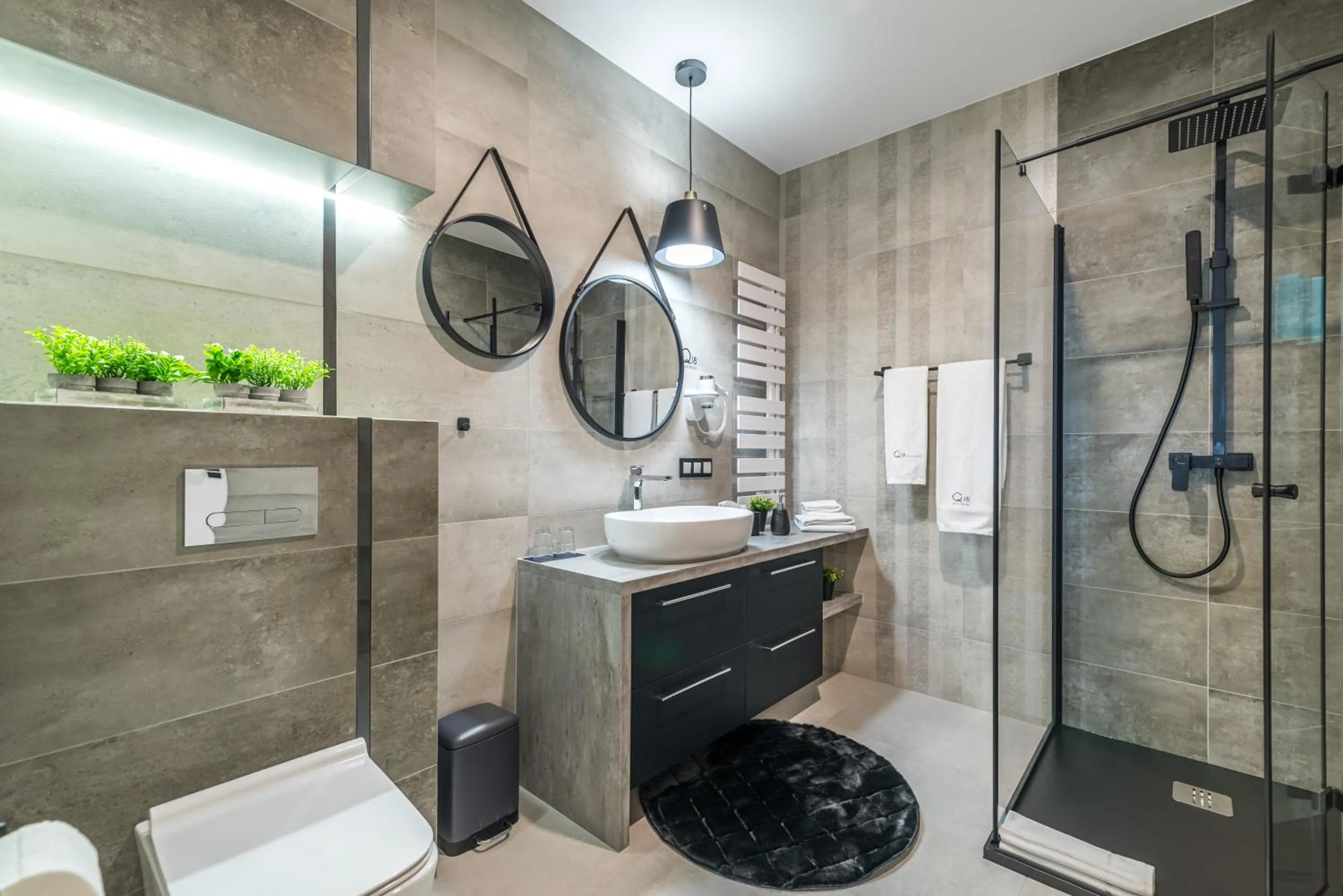 Shower in Q18 ApartHotel