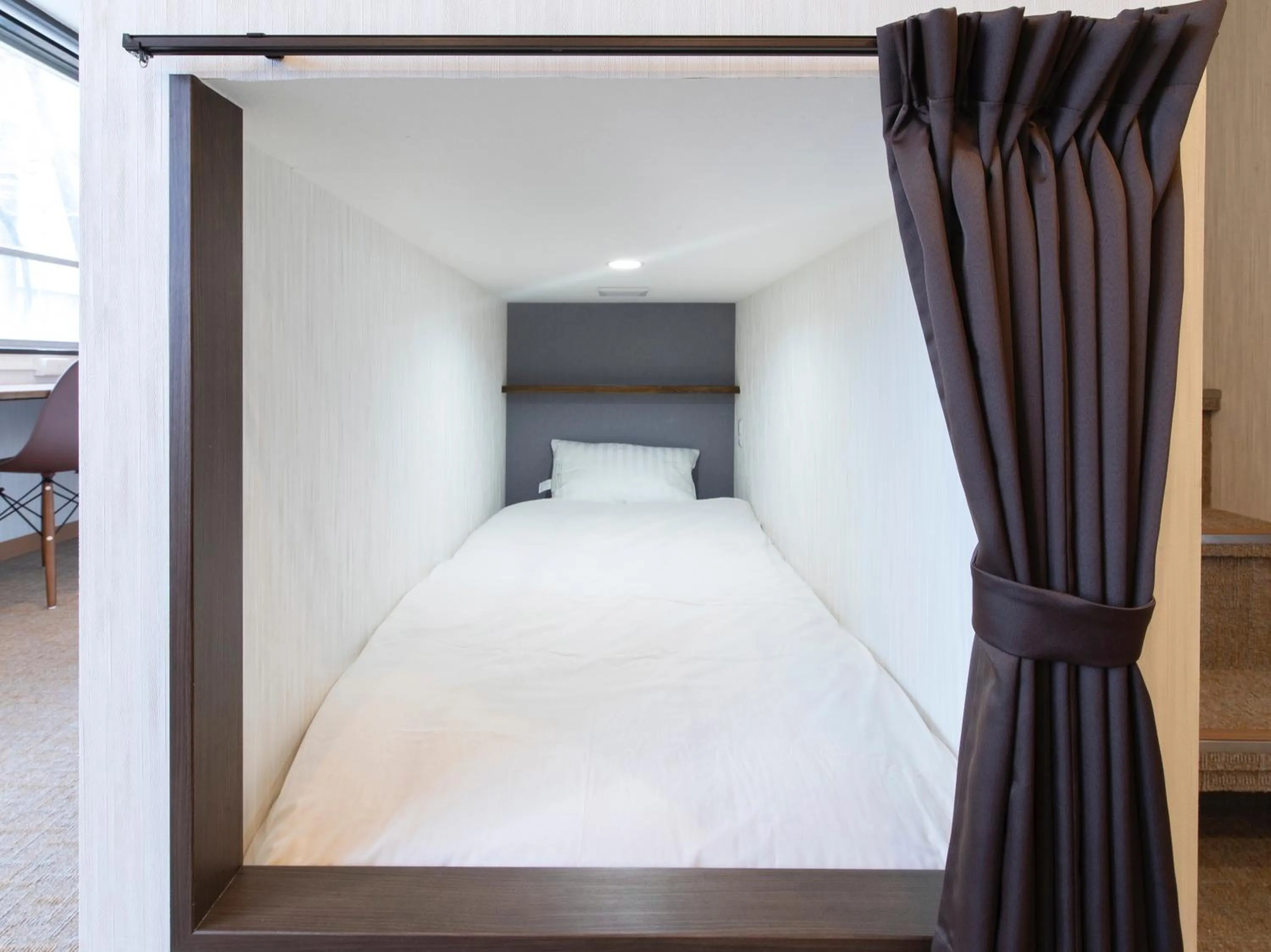 Bed in Tabist Hotel Miyakonojo Miyazaki