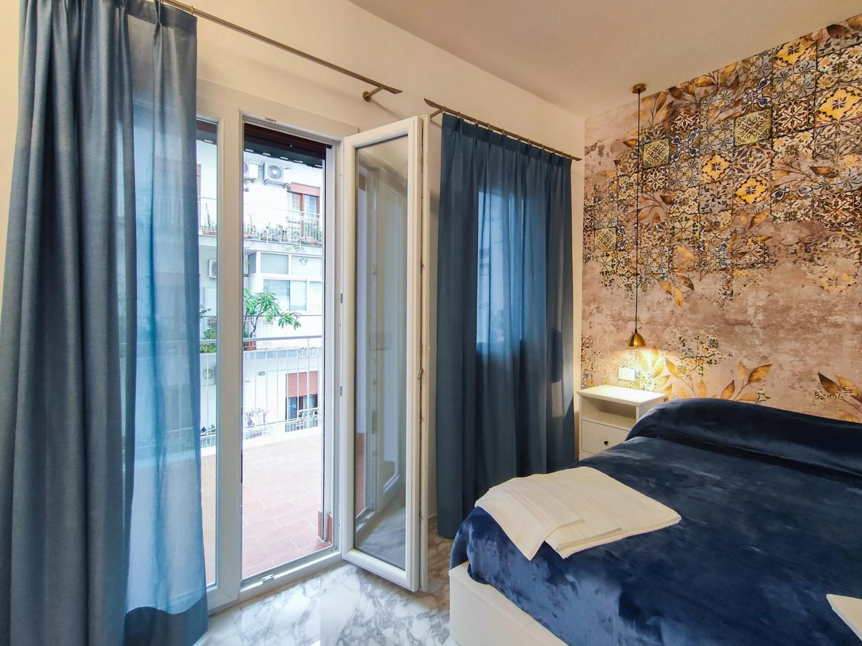 Bed in Cubacalatafimi Rooms