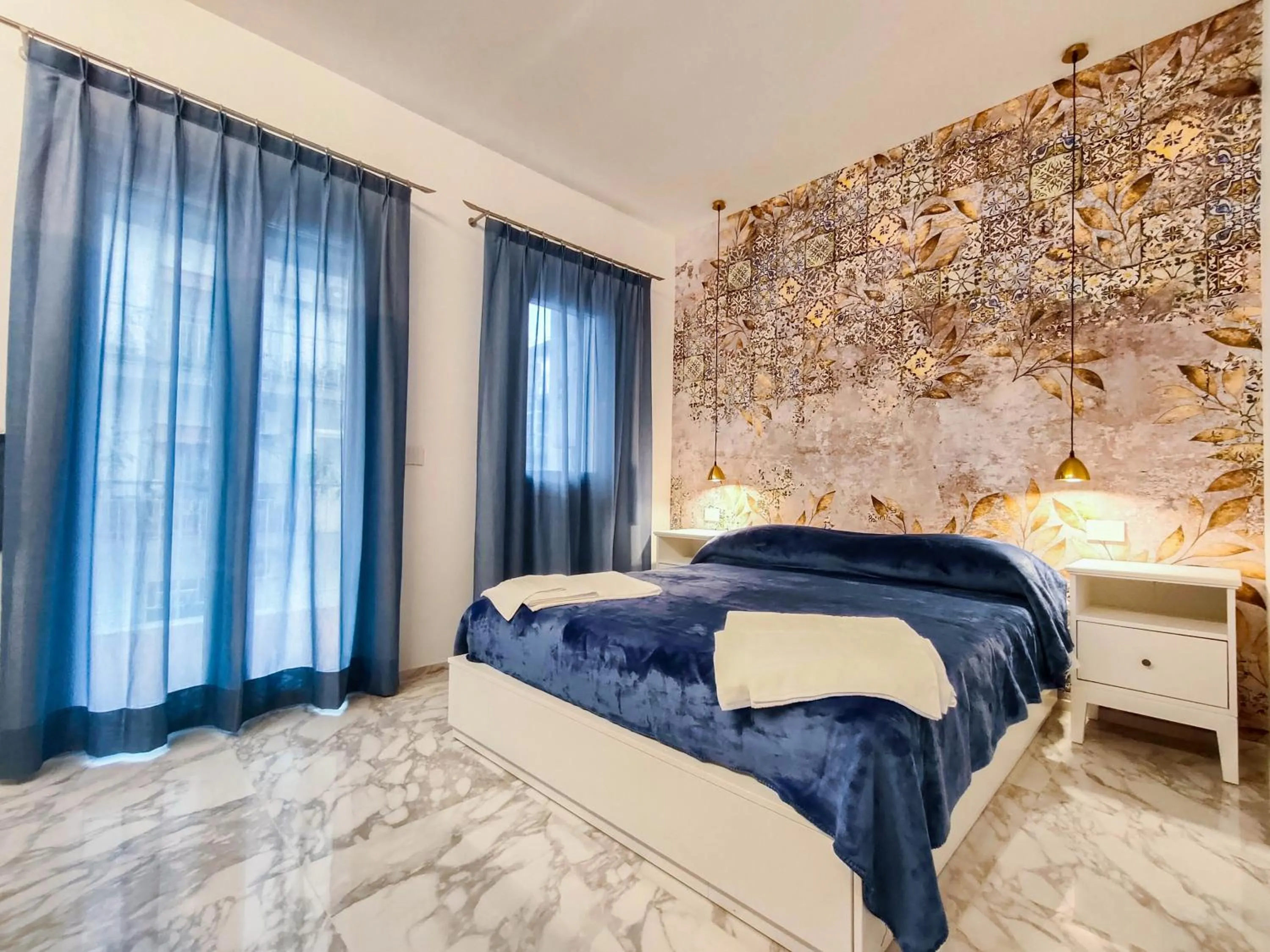 Bed in Cubacalatafimi Rooms