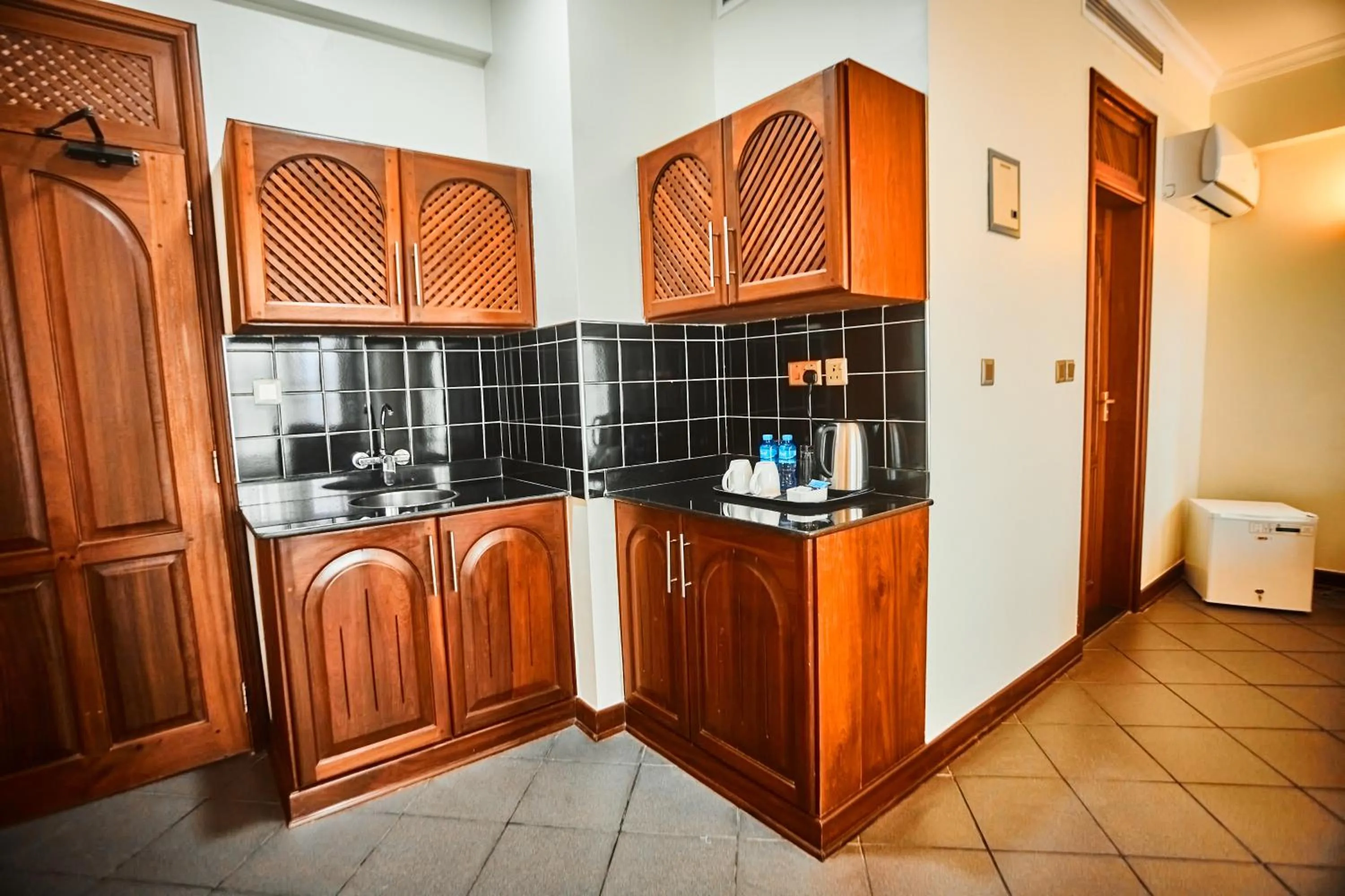 Kitchen or kitchenette in seven skies hotel