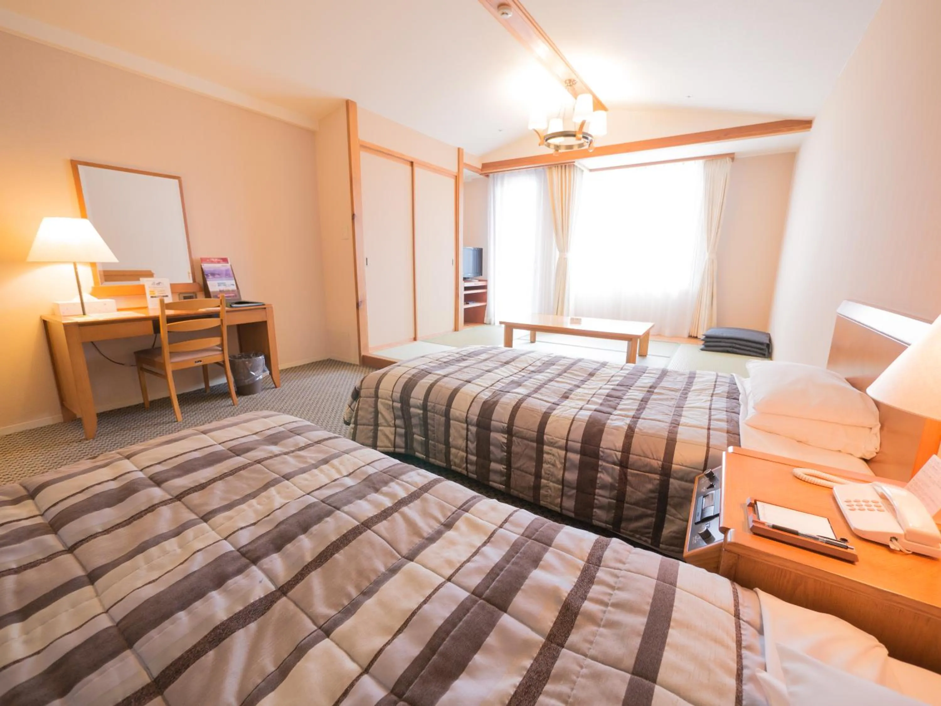 Photo of the whole room, Bed in Hotel Harvest Skijam Katsuyama