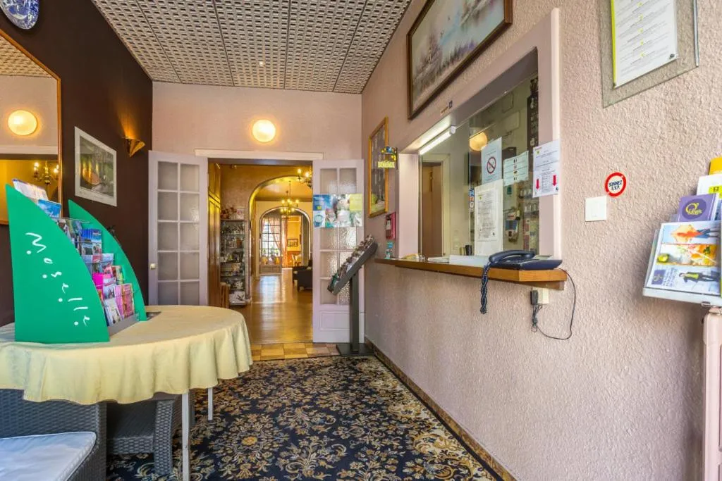 Lobby or reception in Logis Hotel Restaurant Remotel