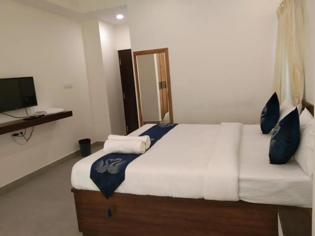 Bed in Hotel Amulya Fine Dine