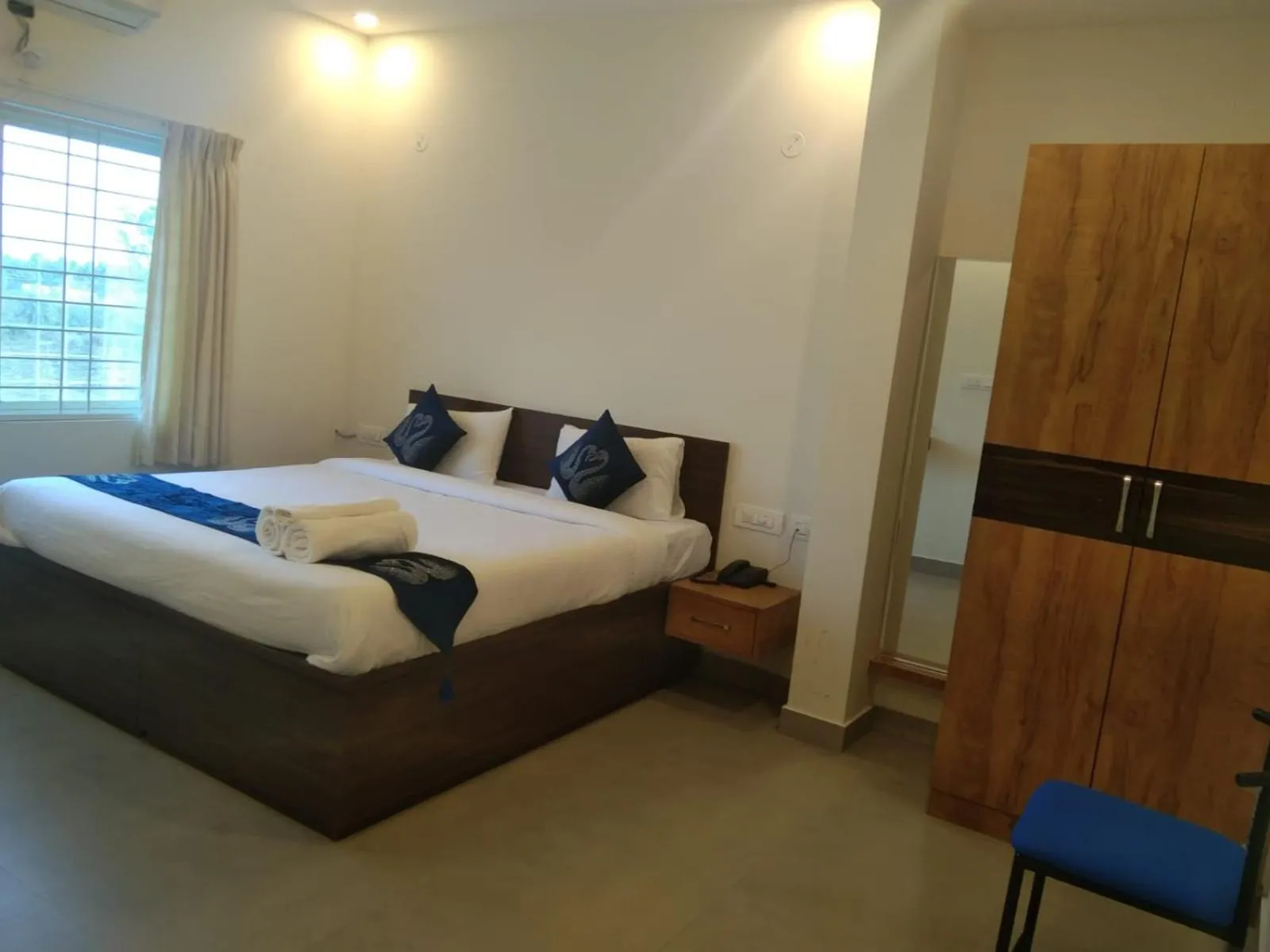 Bed in Hotel Amulya Fine Dine